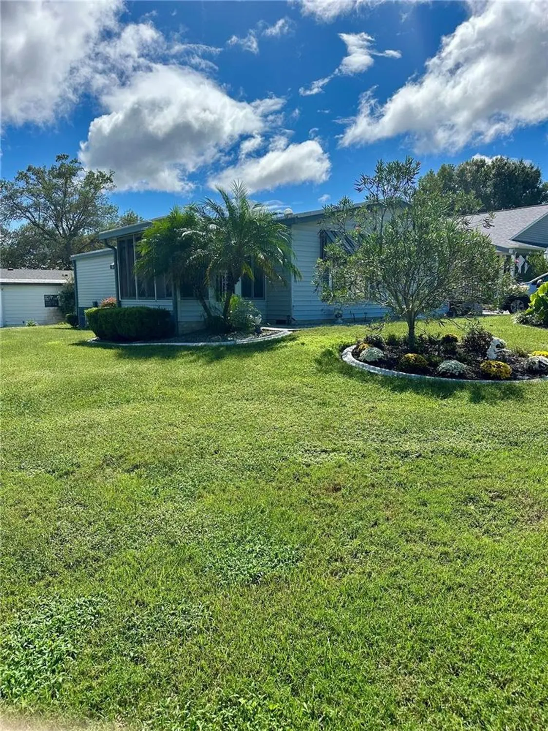 Property Slideshow image 4 of 37 | 1701 palm aire dr, The Villages, FL, 32159