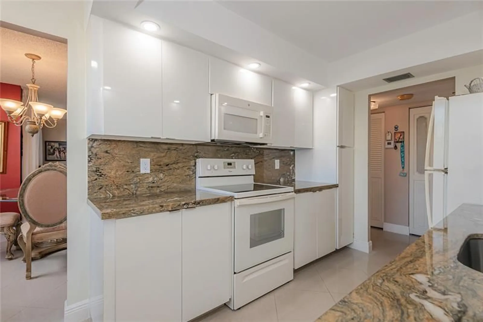 Property Slideshow image 12 of 26 | 1200 saint charles pl l19, Pembroke Pines, FL, 33026