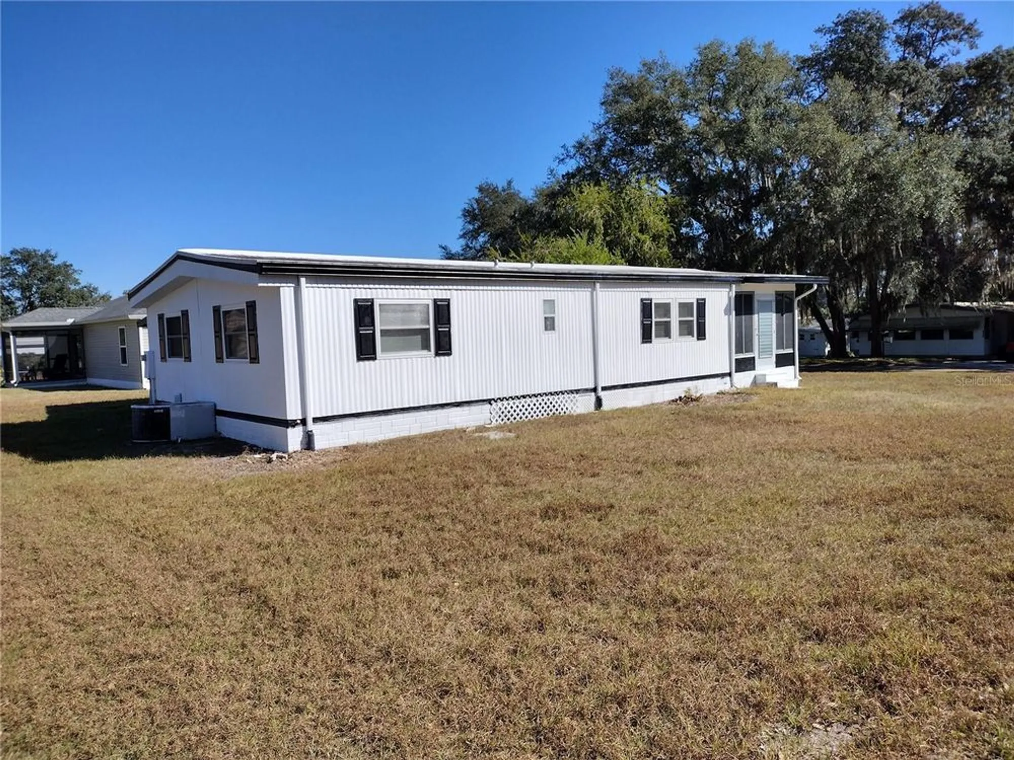 Property Slideshow image 4 of 22 | 925 beechwood ave, Lady Lake, FL, 32159