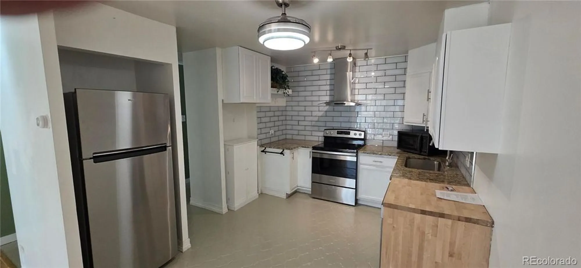 Property Slideshow image 4 of 14 | 705 s alton way unit 6b, Denver, CO, 80247