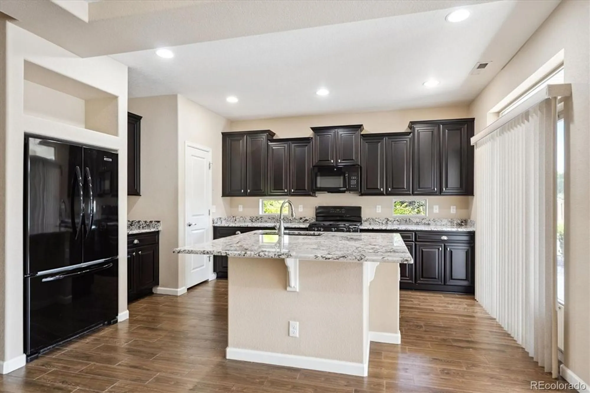 Property Slideshow image 11 of 24 | 5520 genoa st, Denver, CO, 80249