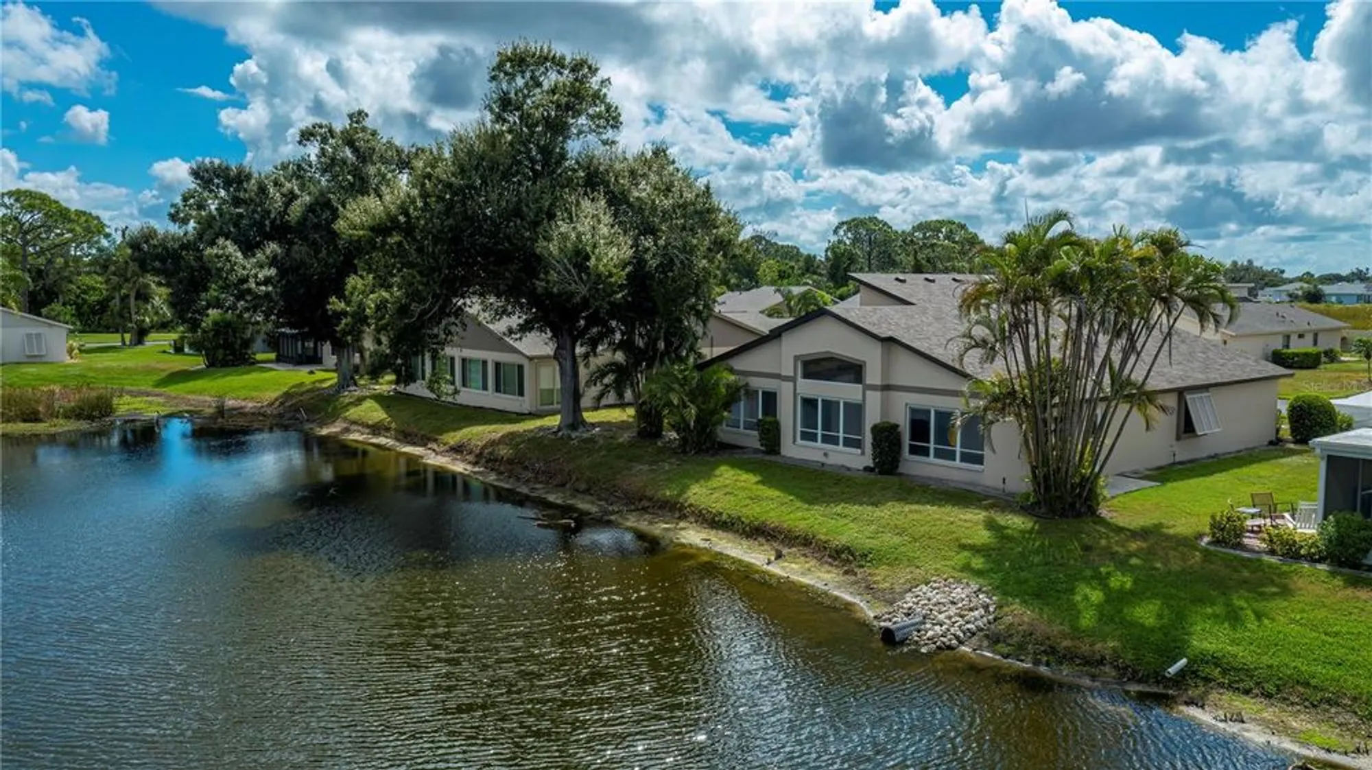 Property Slideshow image 2 of 58 | 425 cypress forest dr, Englewood, FL, 34223