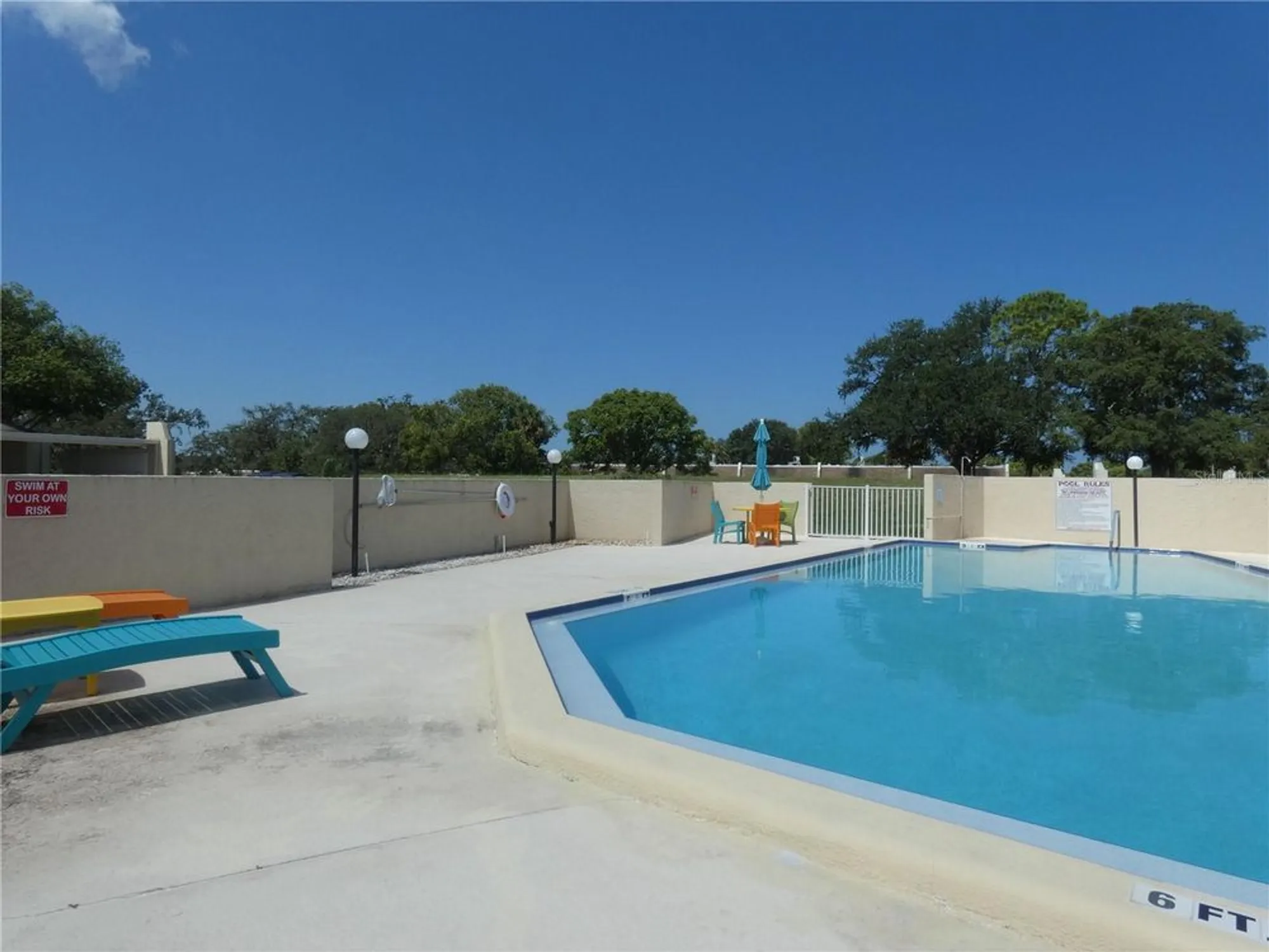 Property Slideshow image 7 of 33 | 11231 dollar lake dr apt 6, Port Richey, FL, 34668