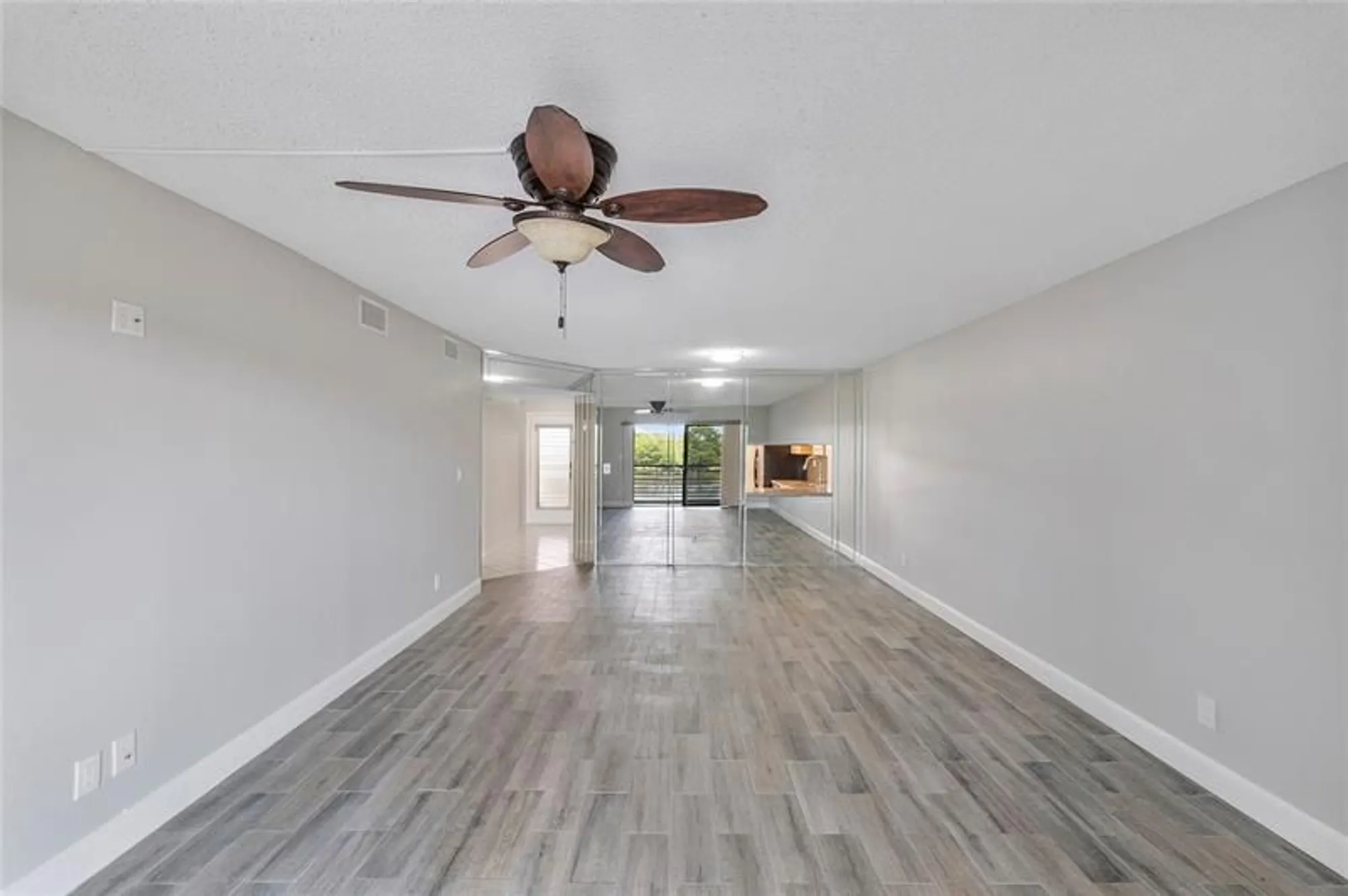 Property Slideshow image 2 of 15 | 4930 e sabal palm blvd apt 402, Tamarac, FL, 33319