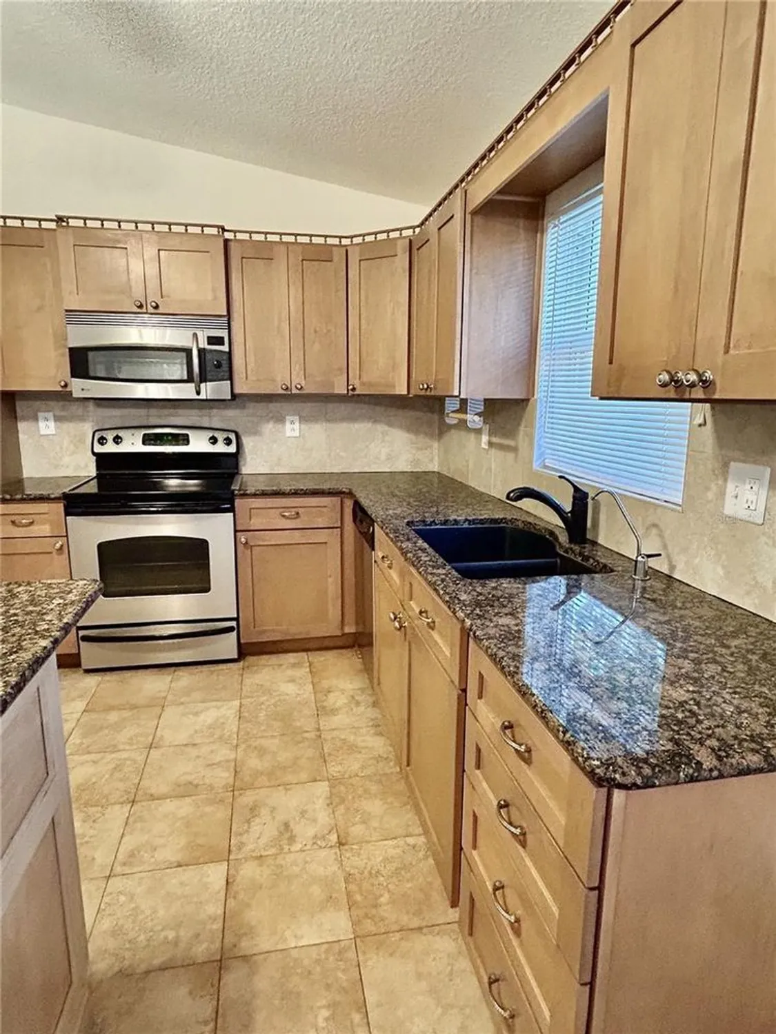 Property Slideshow image 8 of 19 | 1421 heather ridge blvd # 1421, Dunedin, FL, 34698