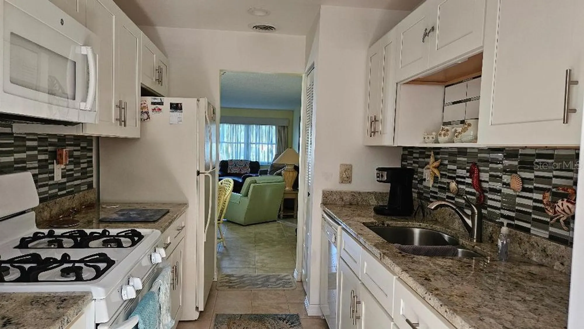 Property Slideshow image 4 of 32 | 5975 terrace park dr n unit 102, St Petersburg, FL, 33709