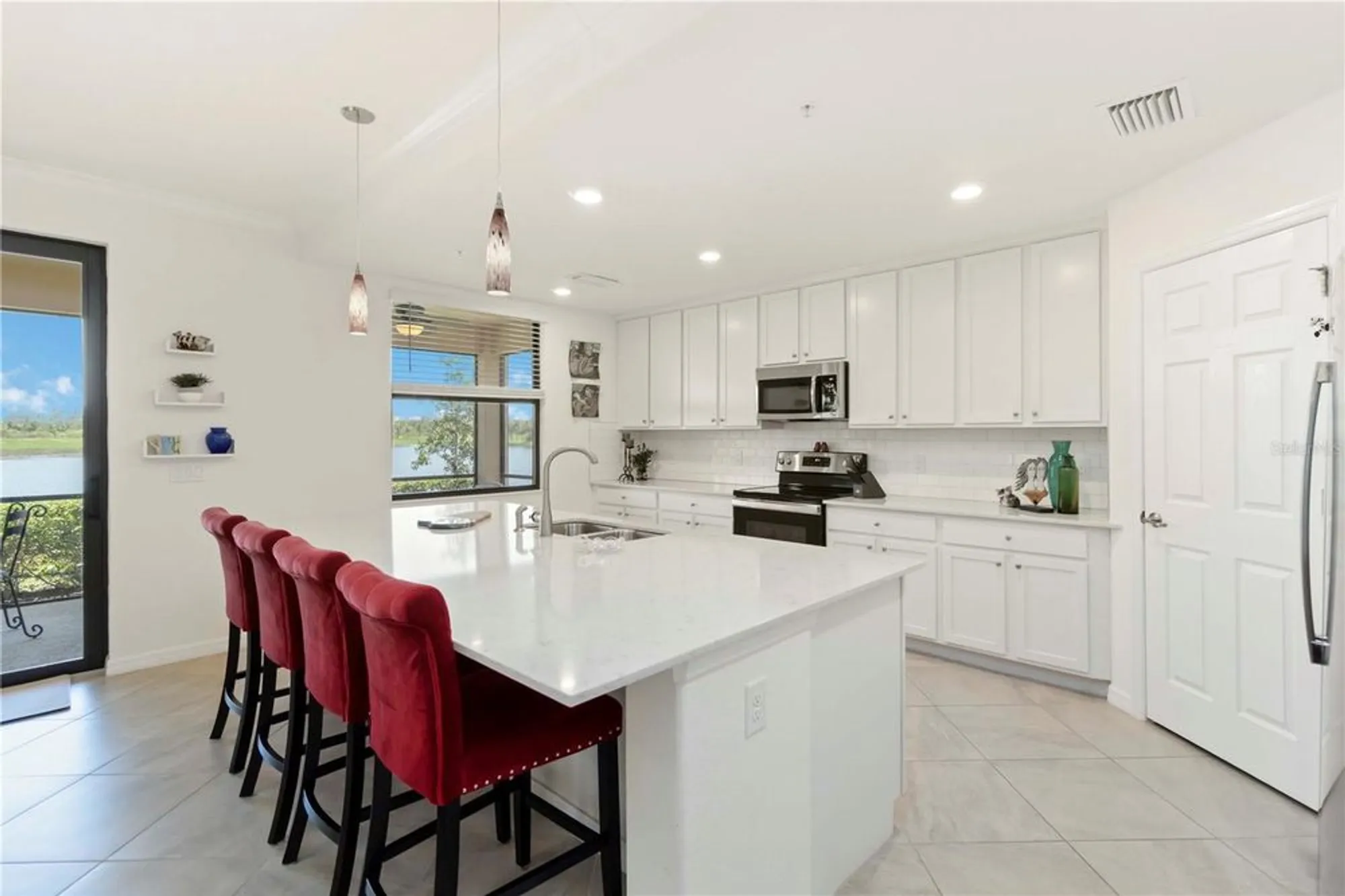 Property Slideshow image 17 of 100 | 10801 tarflower dr 102, Venice, FL, 34293