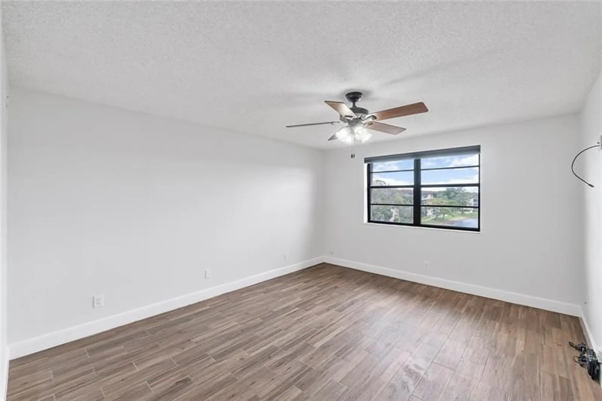 Property Slideshow image 6 of 15 | 4930 e sabal palm blvd apt 402, Tamarac, FL, 33319