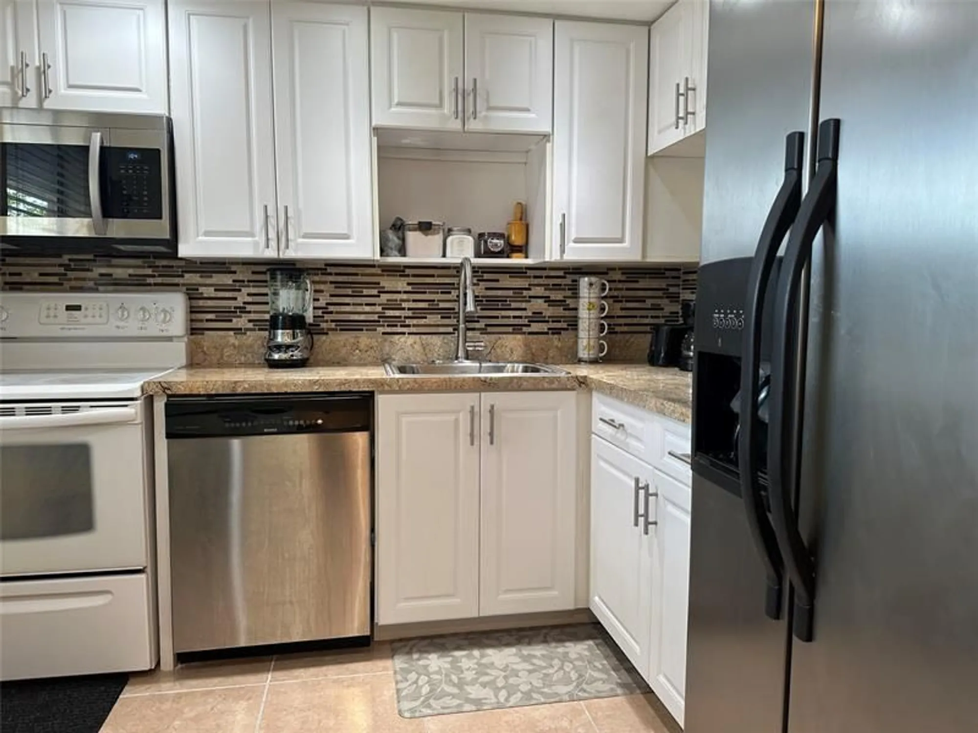 Property Slideshow image 8 of 17 | 1015 country club dr 307, Margate, FL, 33063