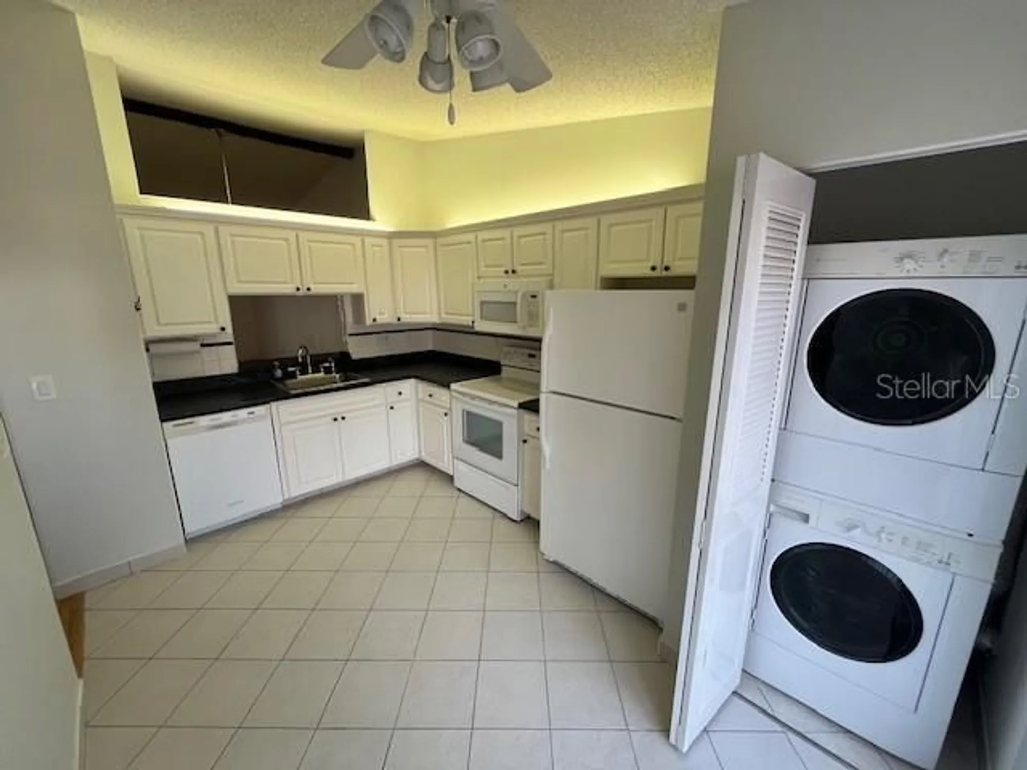 Property Slideshow image 9 of 28 | 1725 pine ridge way e apt e c, Palm Harbor, FL, 34684