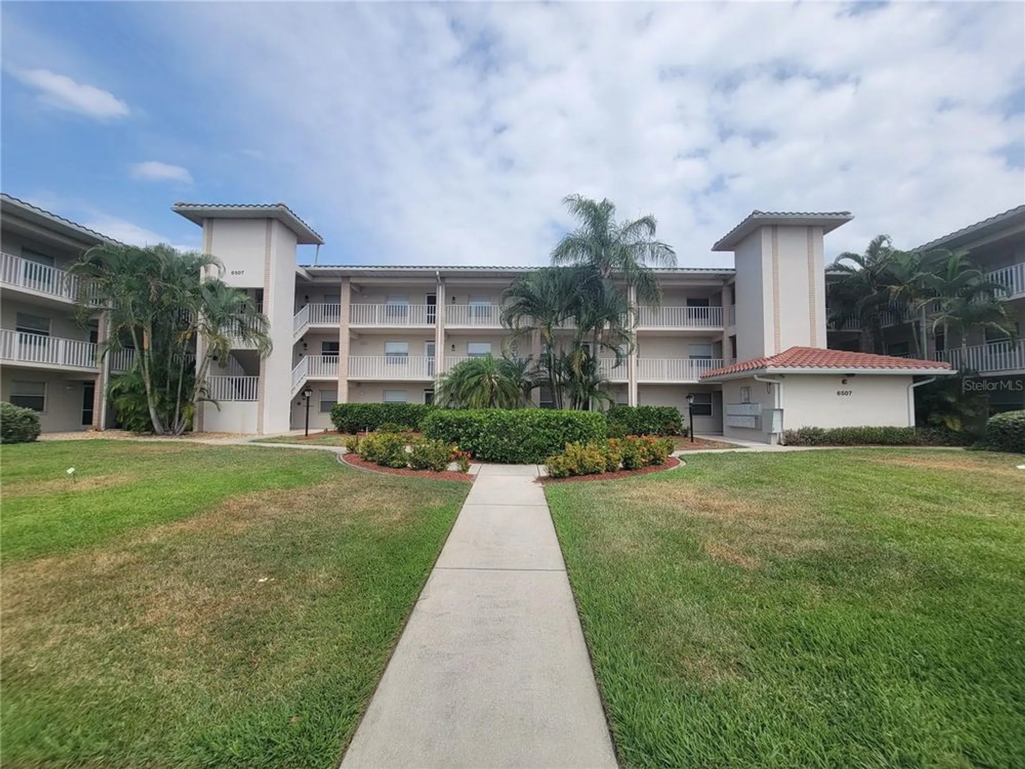 Property Slideshow image 1 of 44 | 6507 stone river rd 302, Bradenton, FL, 34203