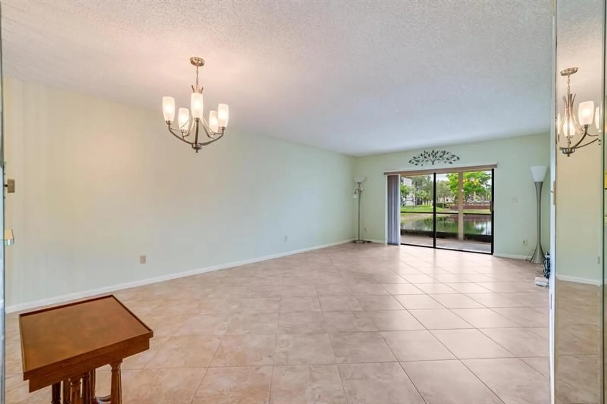 Property Slideshow image 3 of 32 | 4955 e sabal palm blvd 104, Tamarac, FL, 33319