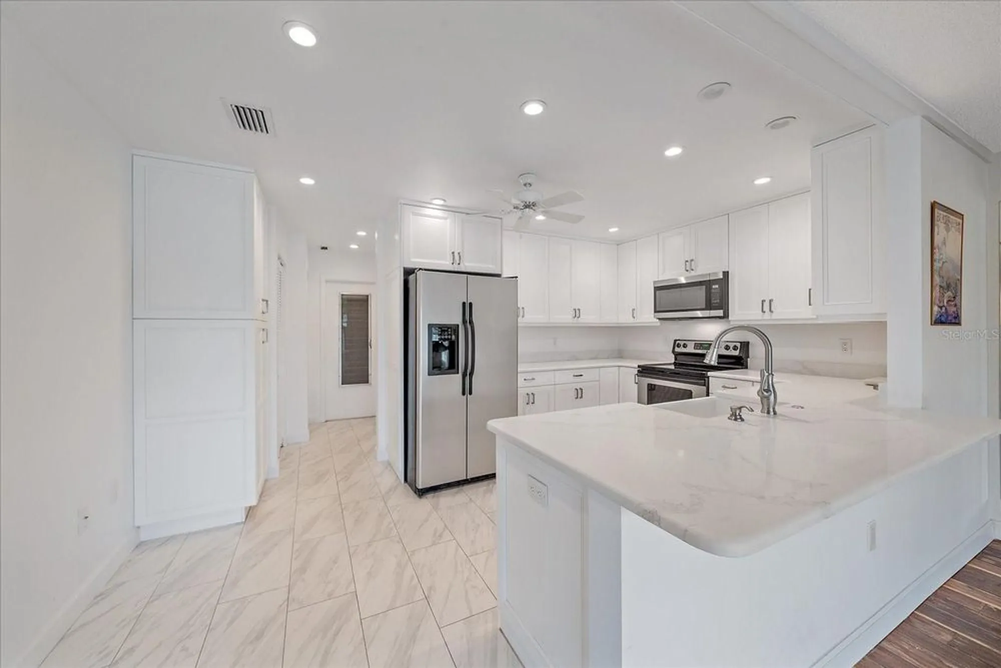 Property Slideshow image 7 of 36 | 7077 w country club dr, Sarasota, FL, 34243