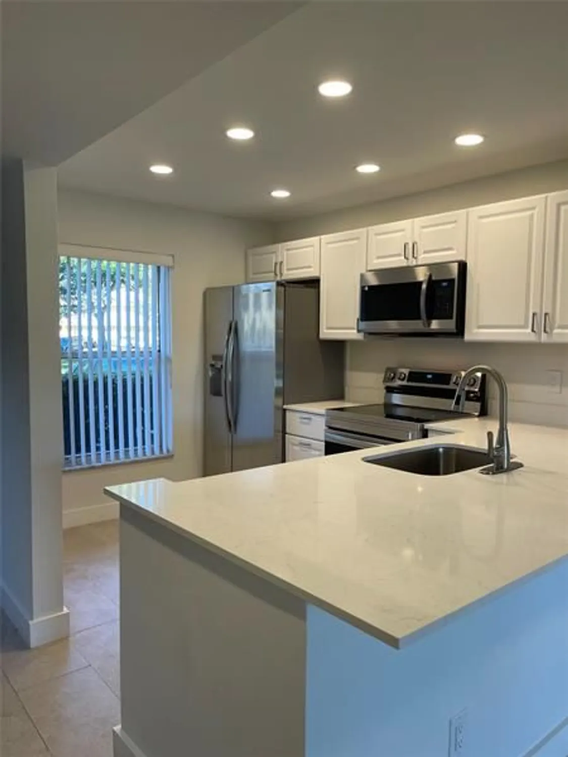 Property Slideshow image 4 of 27 | 5890 nw 64th ave apt 103, Fort Lauderdale, FL, 33319