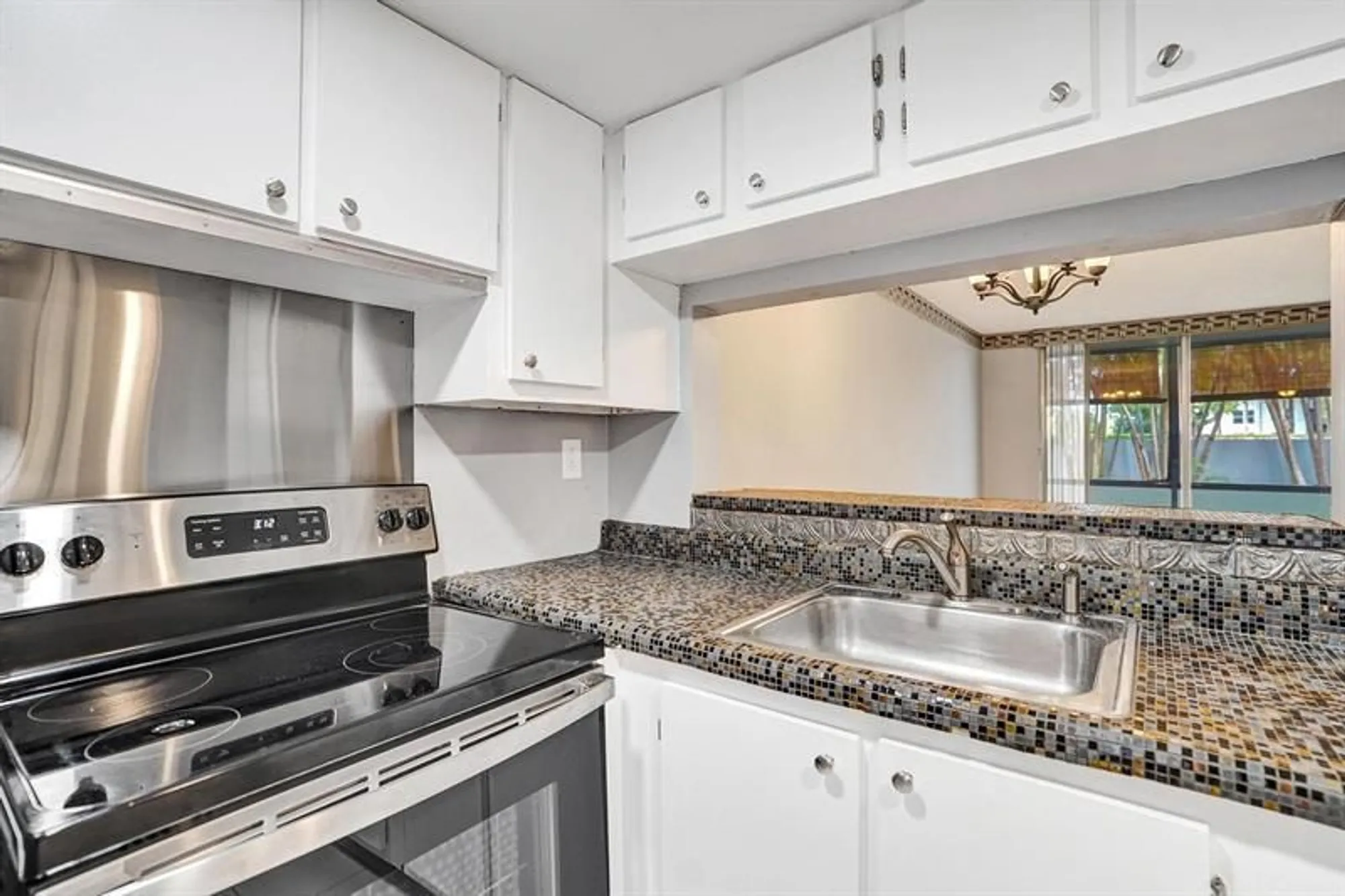 Property Slideshow image 9 of 31 | 9201 lime bay blvd apt 114, Tamarac, FL, 33321