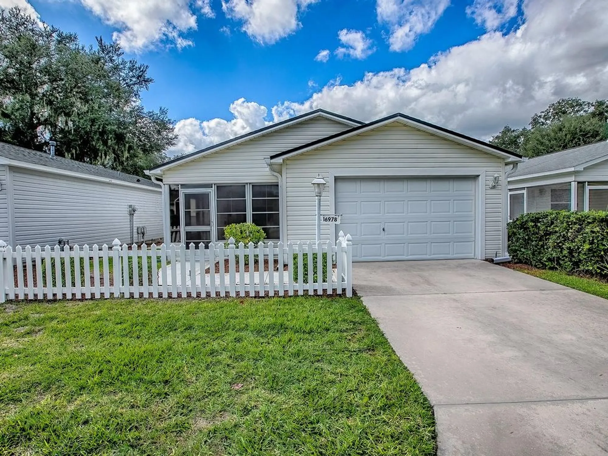 Property Slideshow image 1 of 43 | 16978 se 94th sunnybrook cir, The Villages, FL, 32162