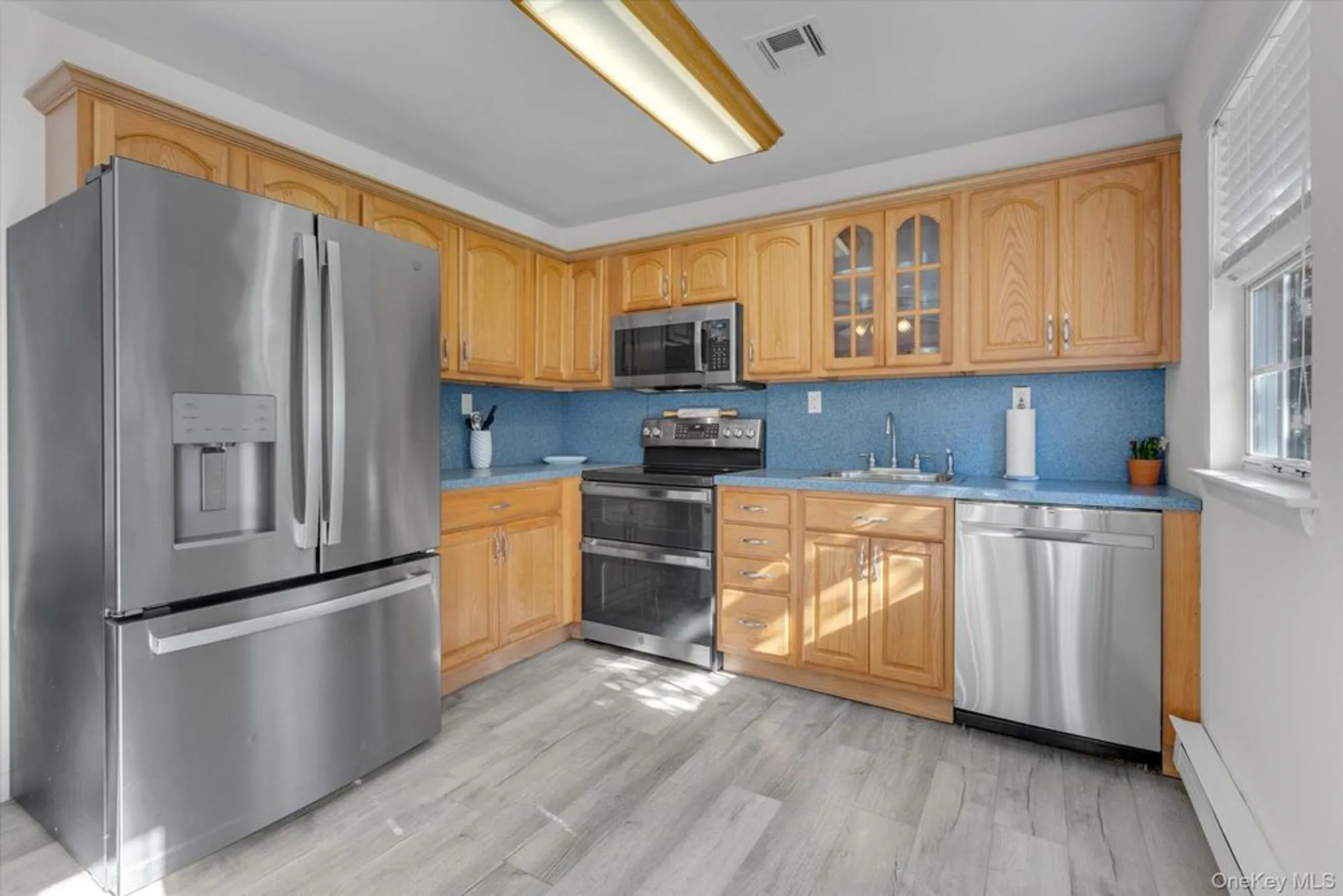 Property Slideshow image 6 of 17 | 416 weymouth ct a, Ridge, NY, 11961
