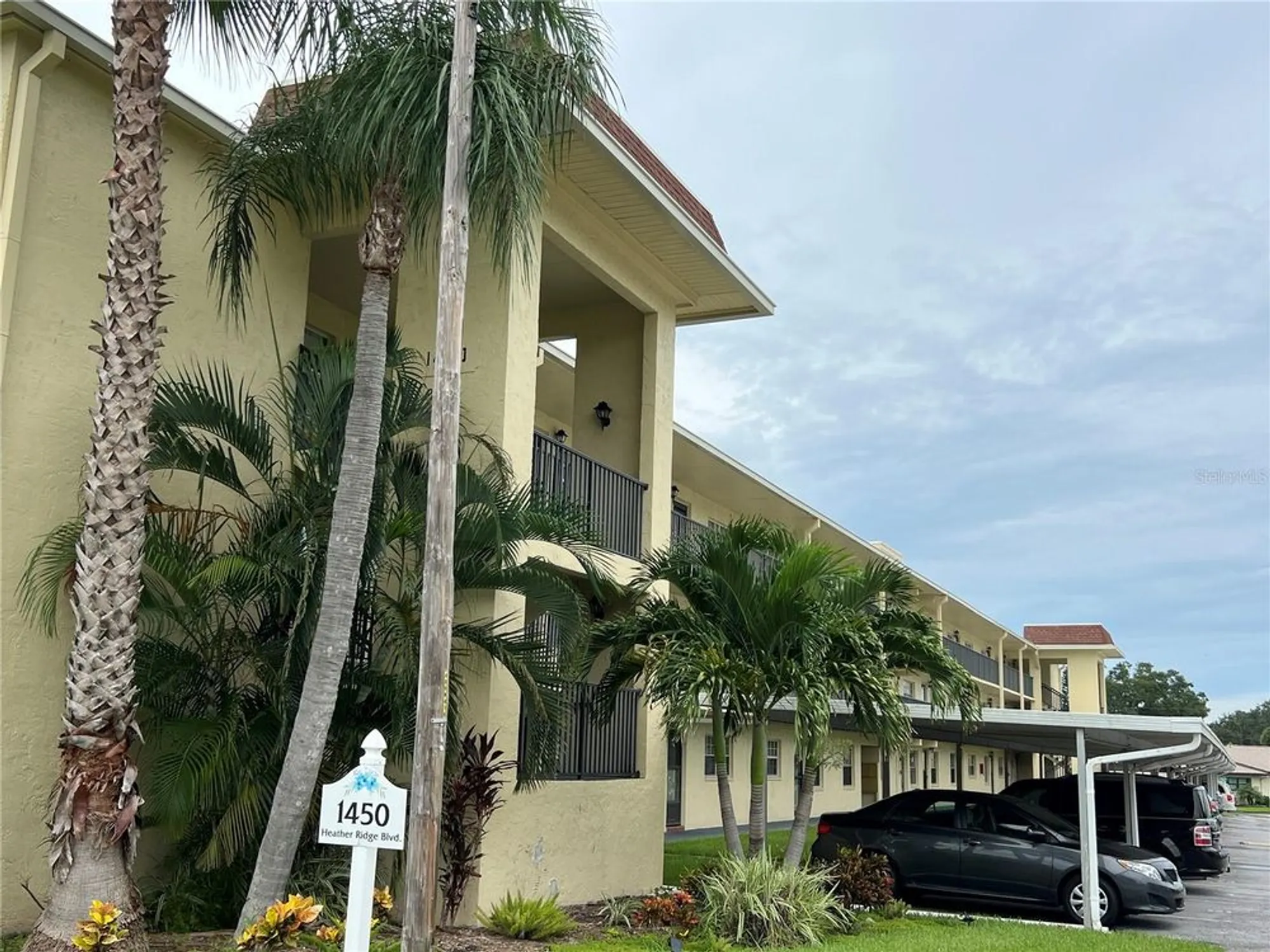 Property Slideshow image 1 of 41 | 1450 heather ridge blvd 307, Dunedin, FL, 34698