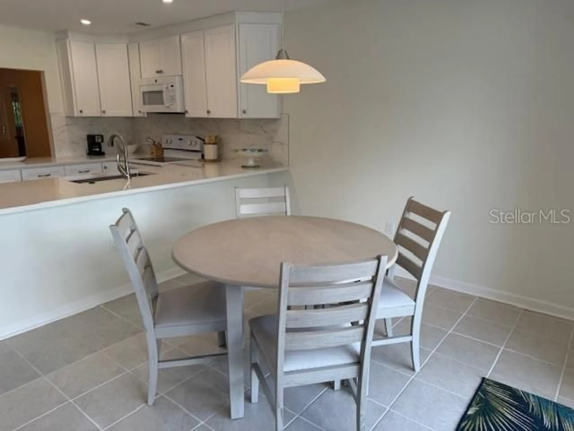 Property Slideshow image 4 of 22 | 6120 country club way 207, Sarasota, FL, 34243