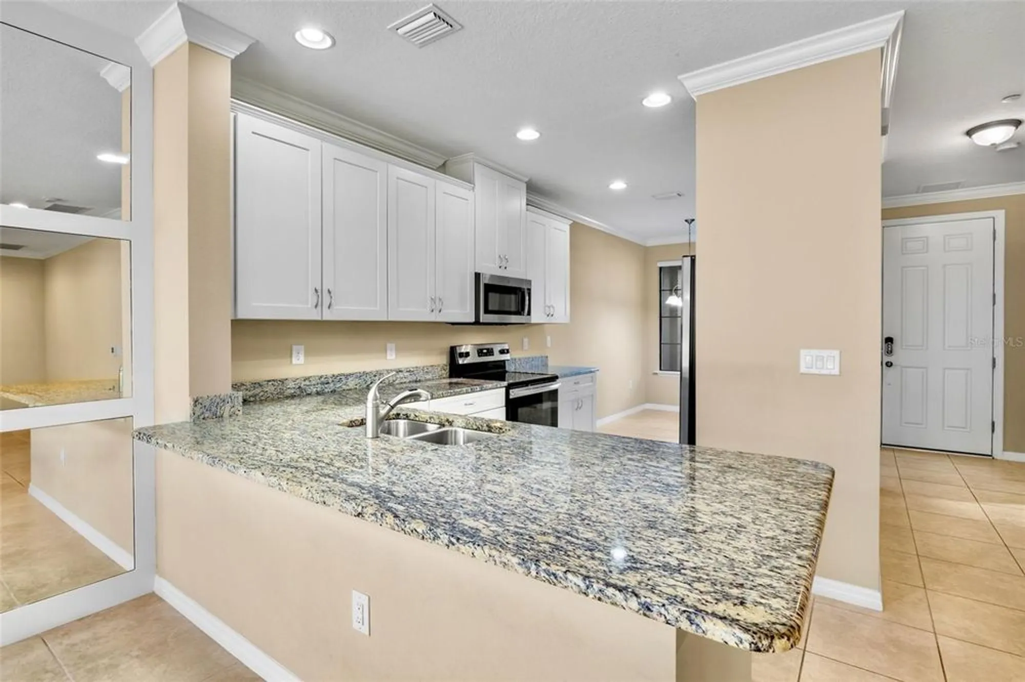 Property Slideshow image 10 of 49 | 5425 cicerone st 103, Sarasota, FL, 34238