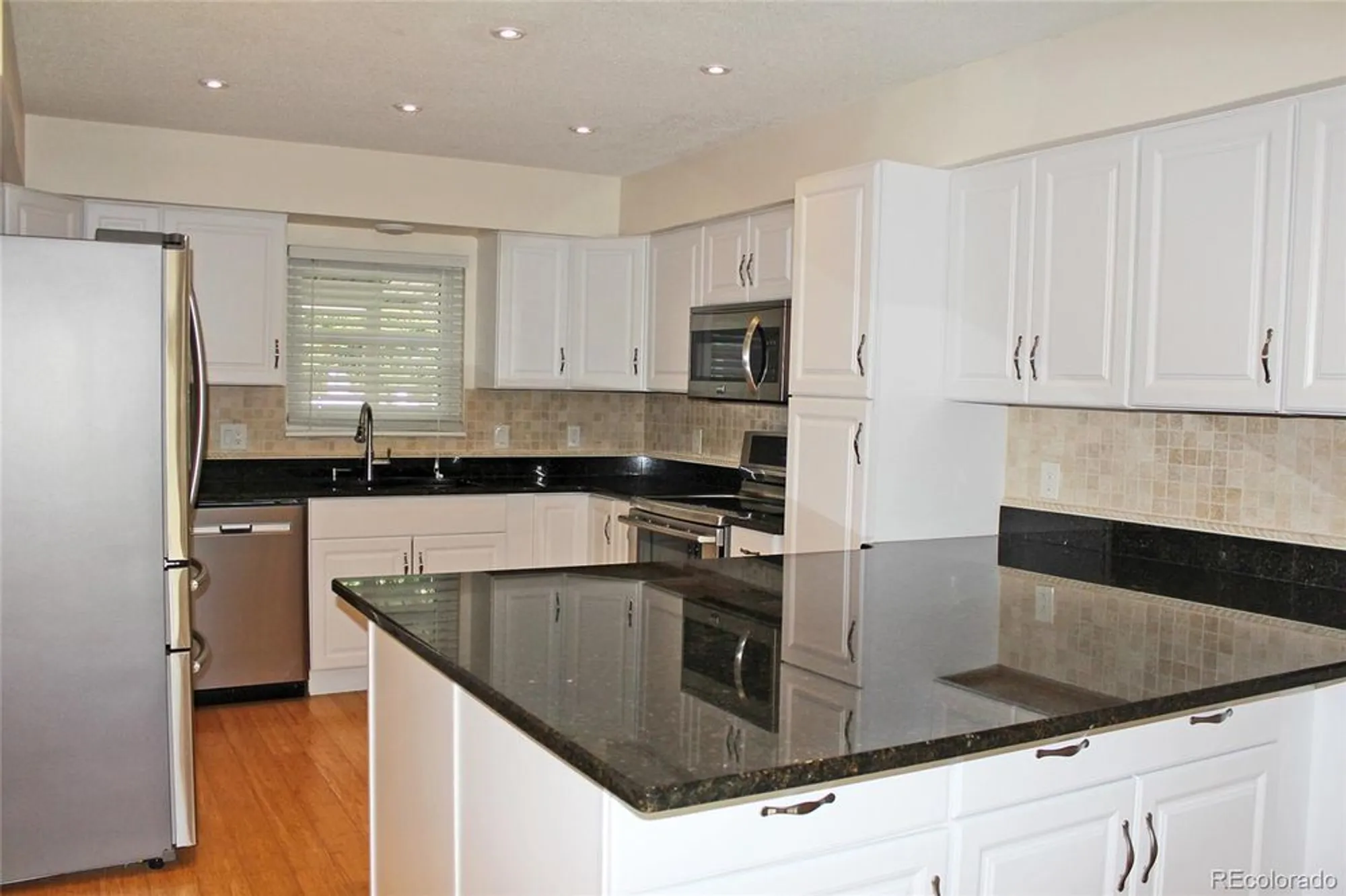 Property Slideshow image 7 of 35 | 2734 s heather gardens way, Aurora, CO, 80014