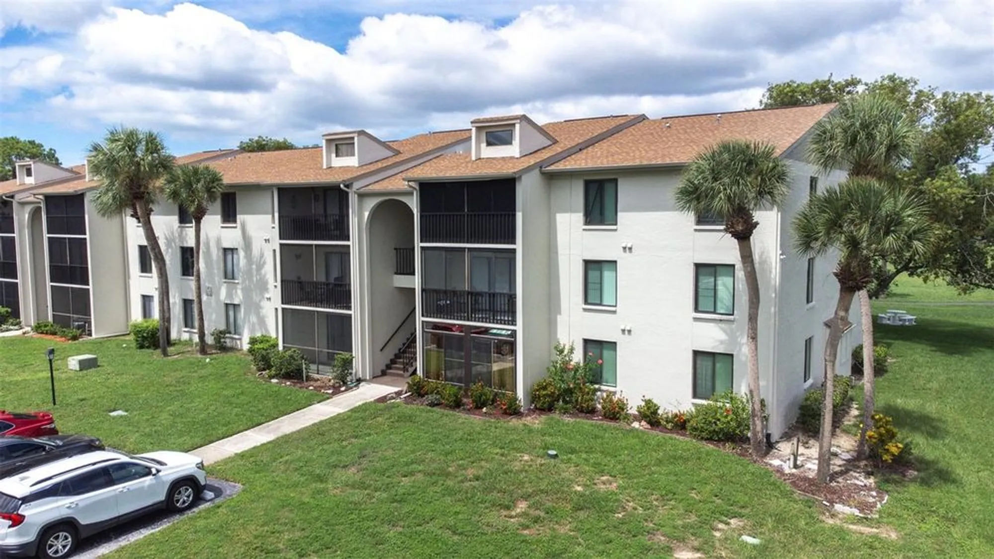 Property Slideshow image 1 of 34 | 1871 pine ridge way w apt h3, Palm Harbor, FL, 34684