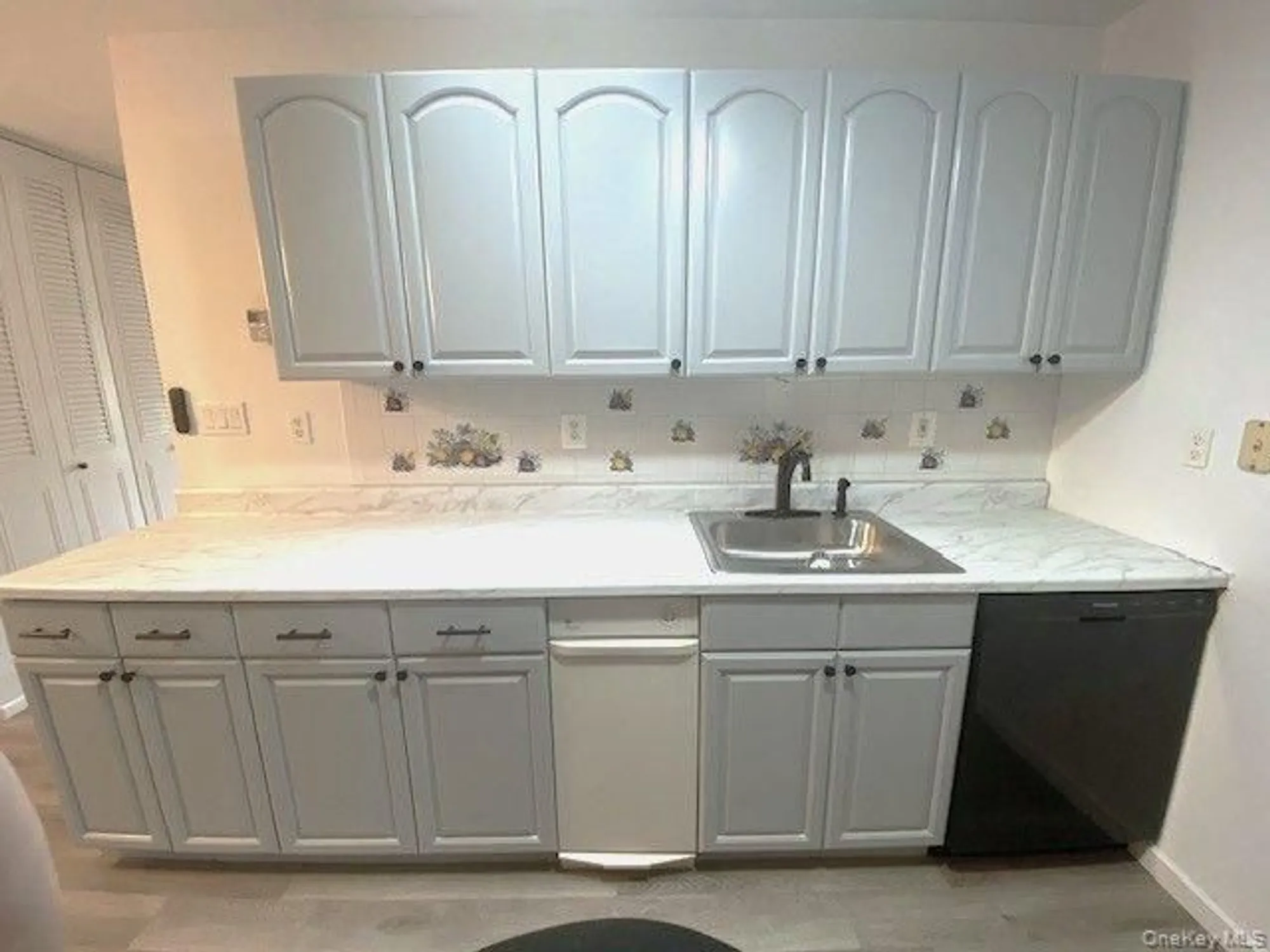 Property Slideshow image 8 of 21 | 259 newcastle ct e, Ridge, NY, 11961