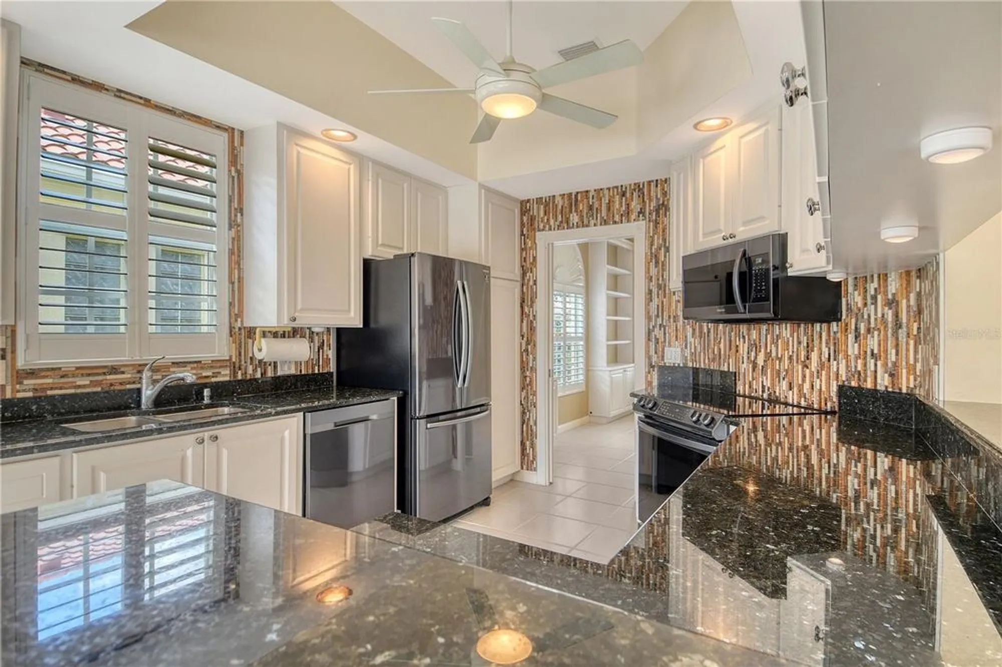 Property Slideshow image 10 of 70 | 5562 octonia pl, Sarasota, FL, 34238