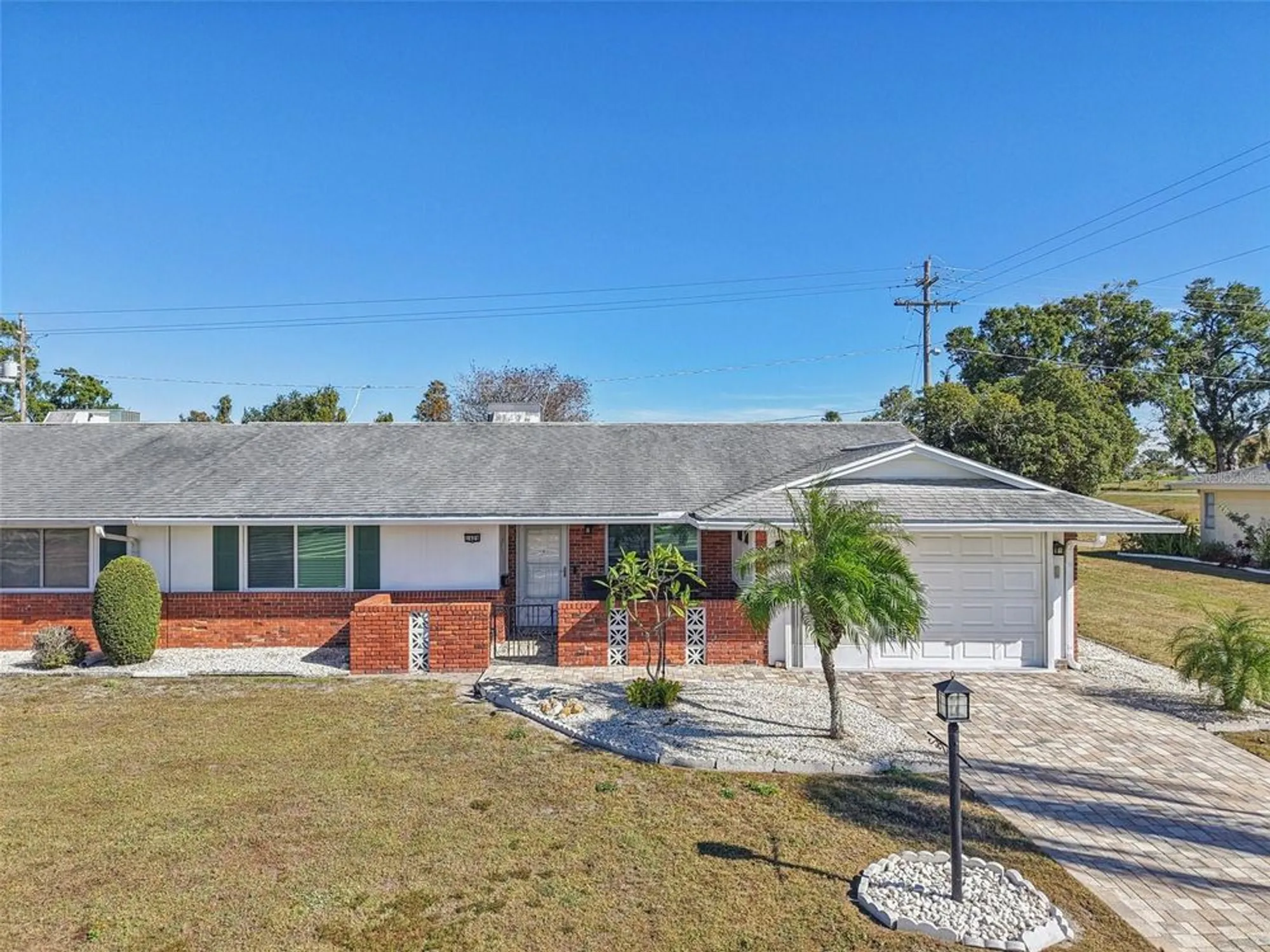 Property Slideshow image 1 of 54 | 1409 n pebble beach blvd, Sun City Center, FL, 33573