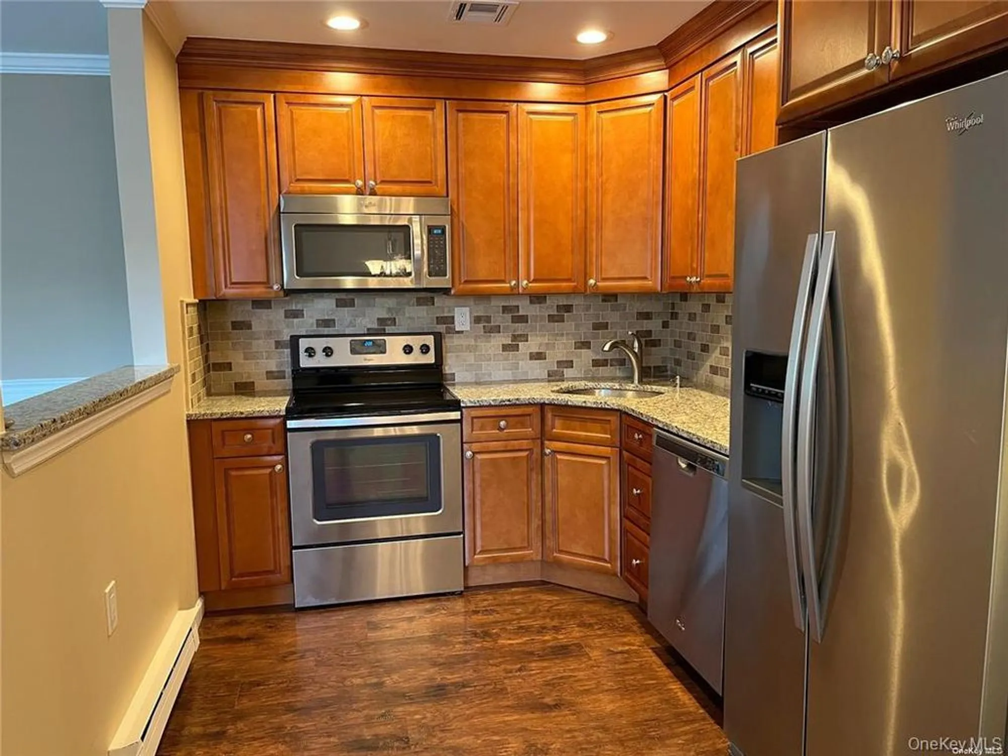 Property Slideshow image 9 of 21 | 424 woodbridge dr d, Ridge, NY, 11961