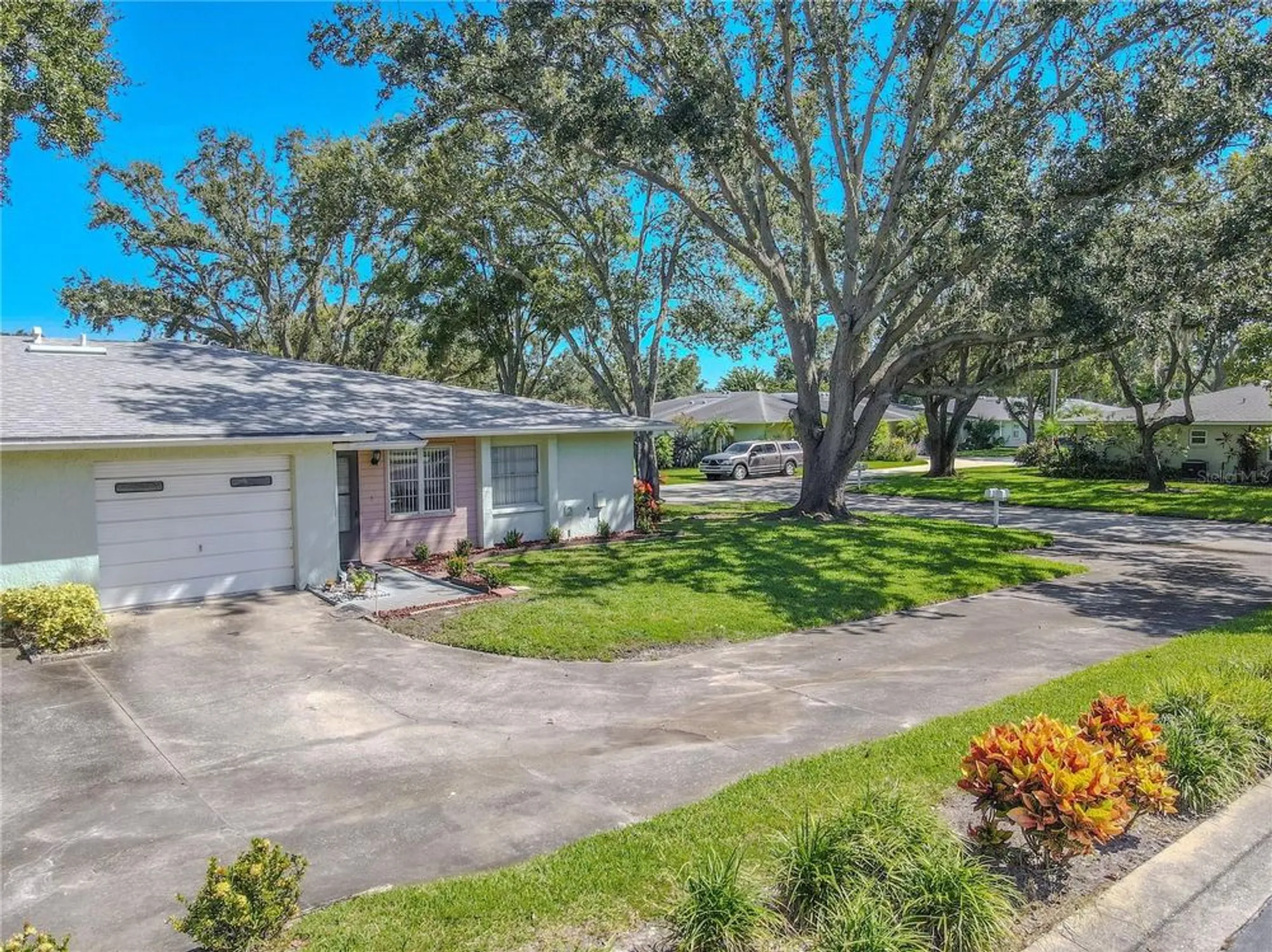 Property Slideshow image 1 of 28 | 1131 orange tree cir c, Palm Harbor, FL, 34684