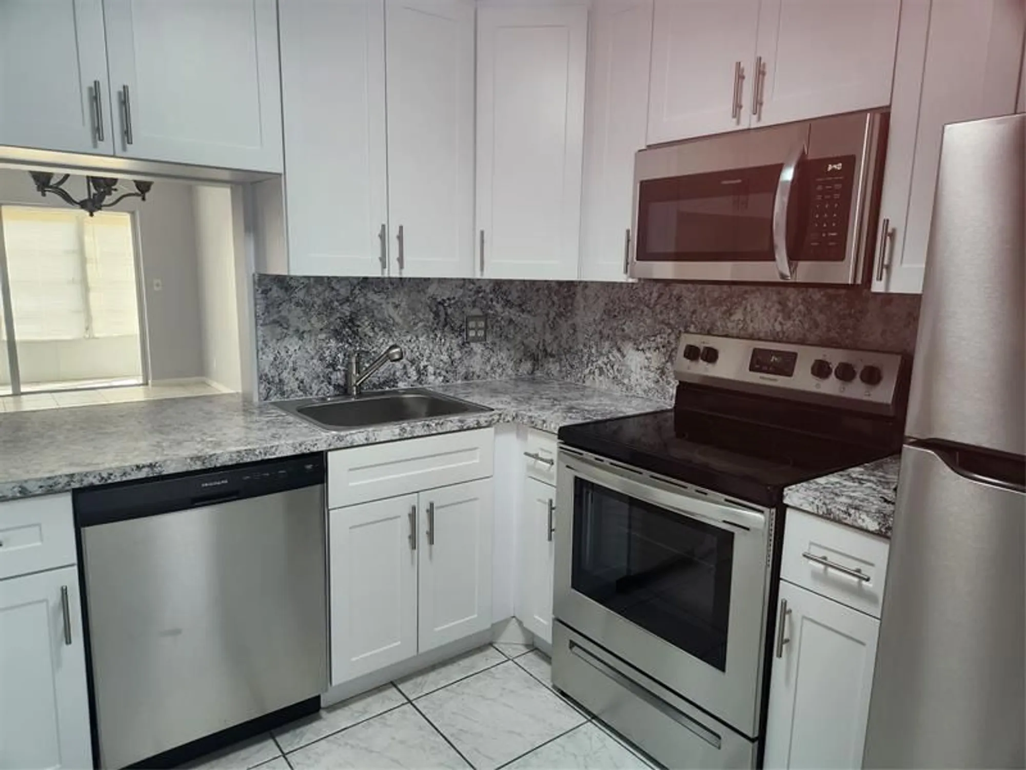 Property Slideshow image 2 of 11 | 2801 nw 47th ter 403b, Lauderdale Lakes, FL, 33313