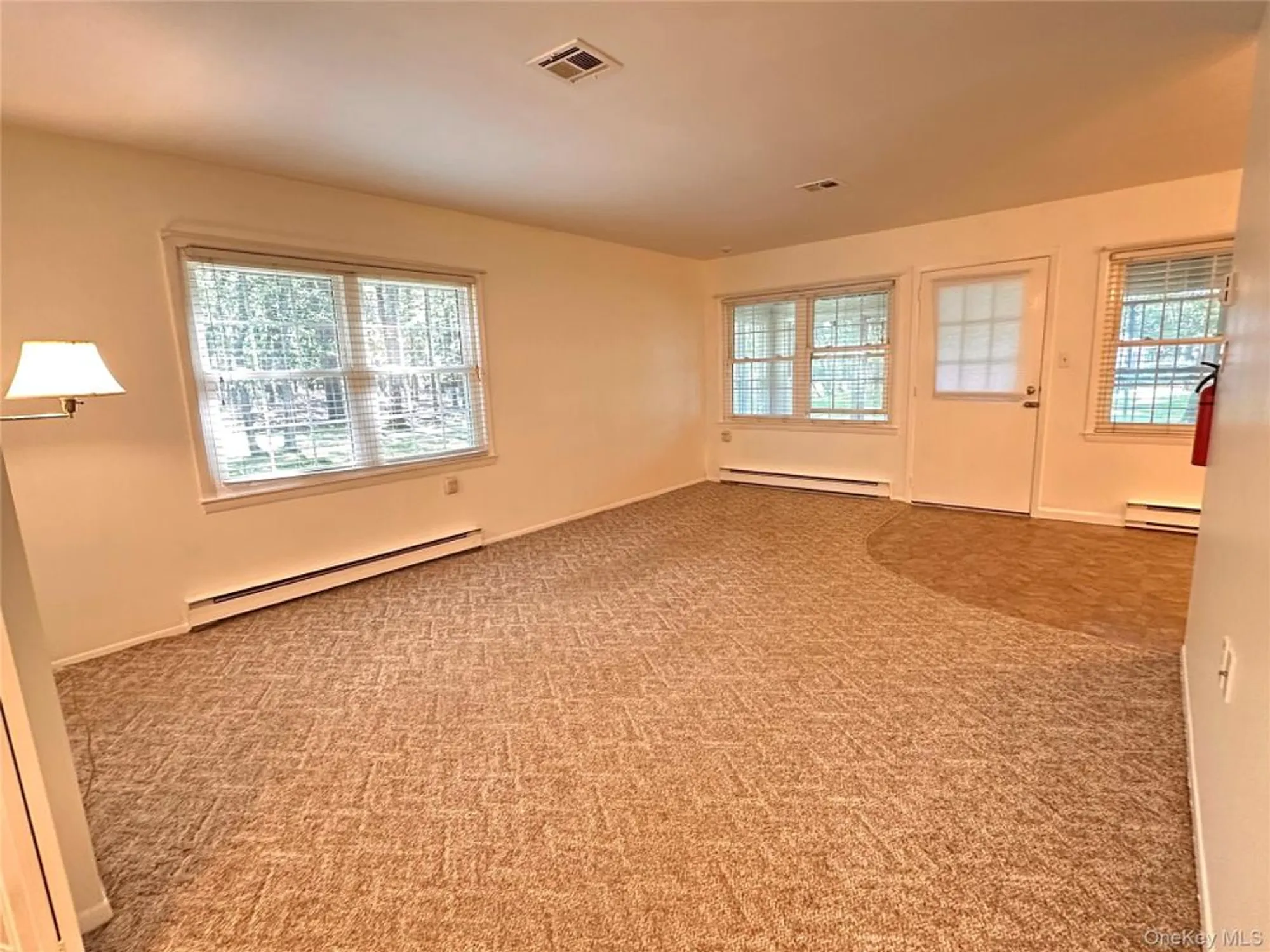 Property Slideshow image 5 of 16 | 231 blackpool ct f, Ridge, NY, 11961