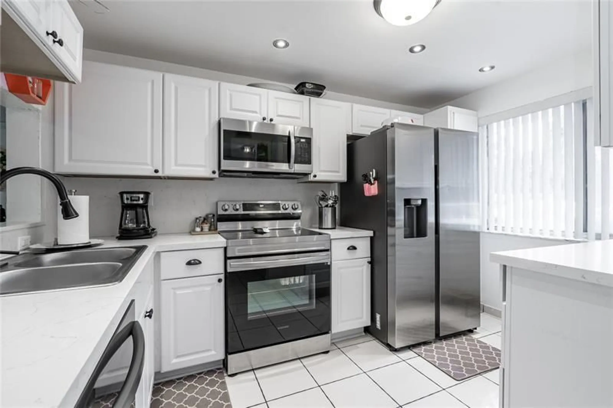 Property Slideshow image 1 of 25 | 3601 inverrary dr apt 107, Lauderhill, FL, 33319