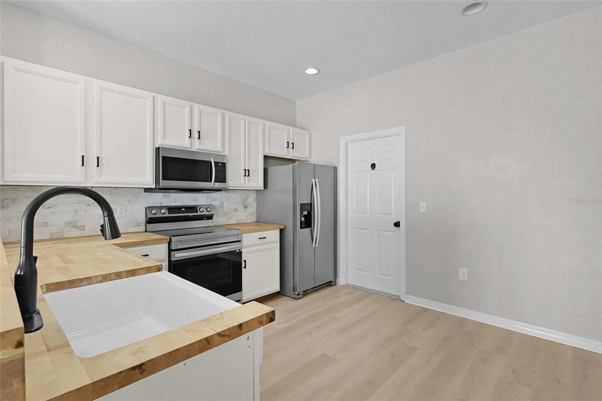 Property Slideshow image 11 of 28 | 4908 ne 123rd ln, Oxford, FL, 34484