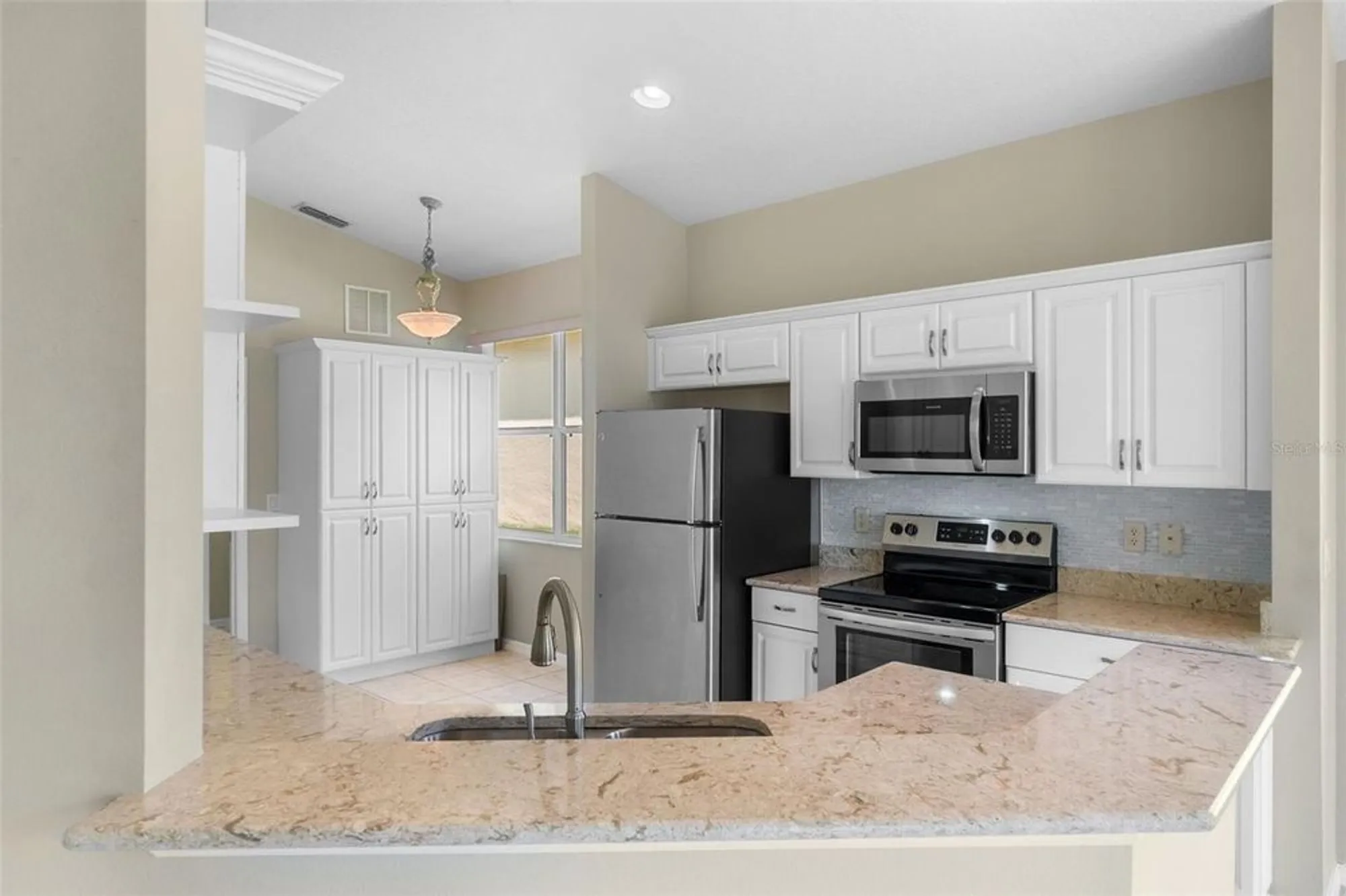 Property Slideshow image 11 of 63 | 890 summit greens blvd, Clermont, FL, 34711