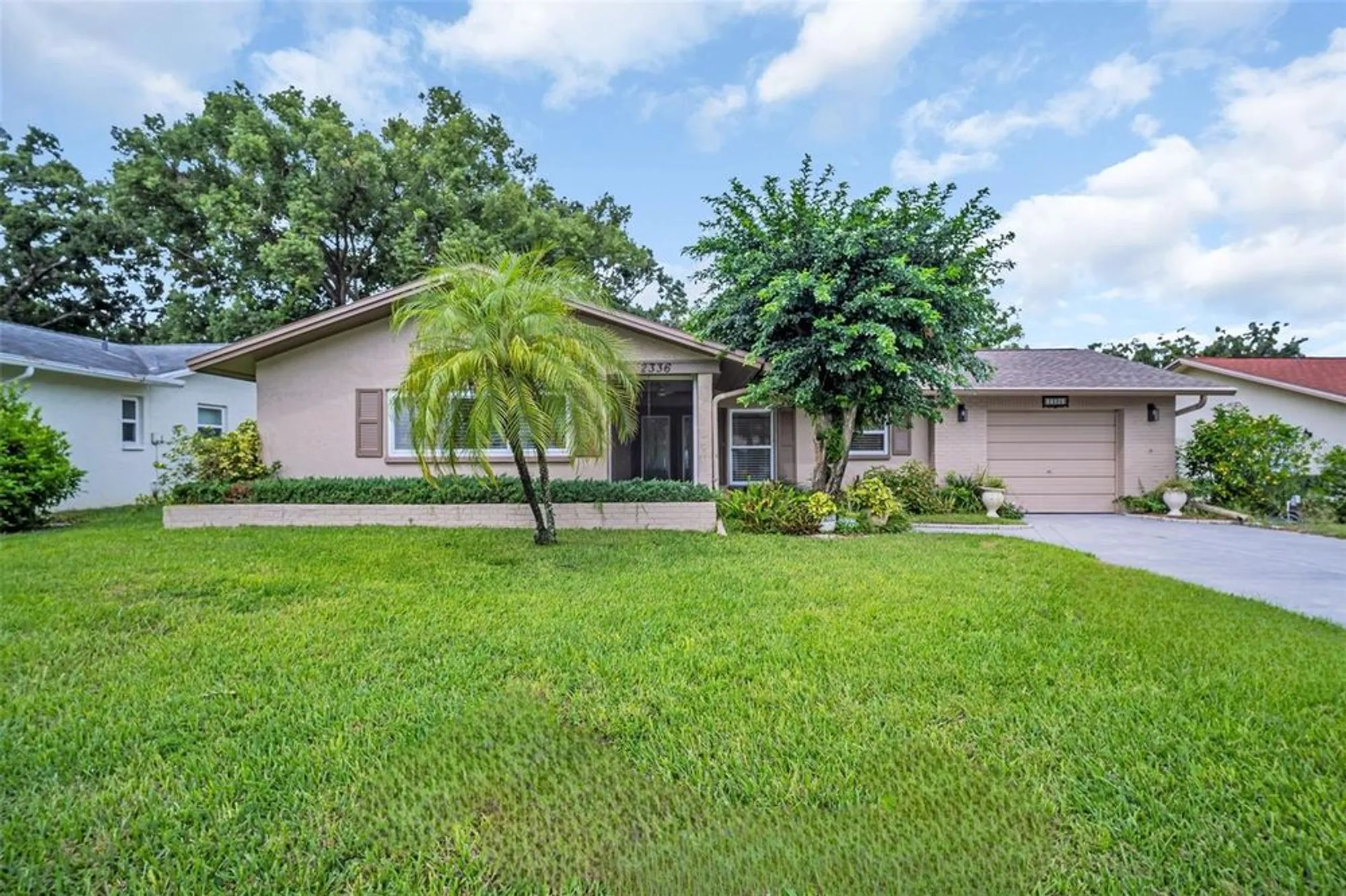 Property Slideshow image 1 of 47 | 2336 malcolm dr, Palm Harbor, FL, 34684