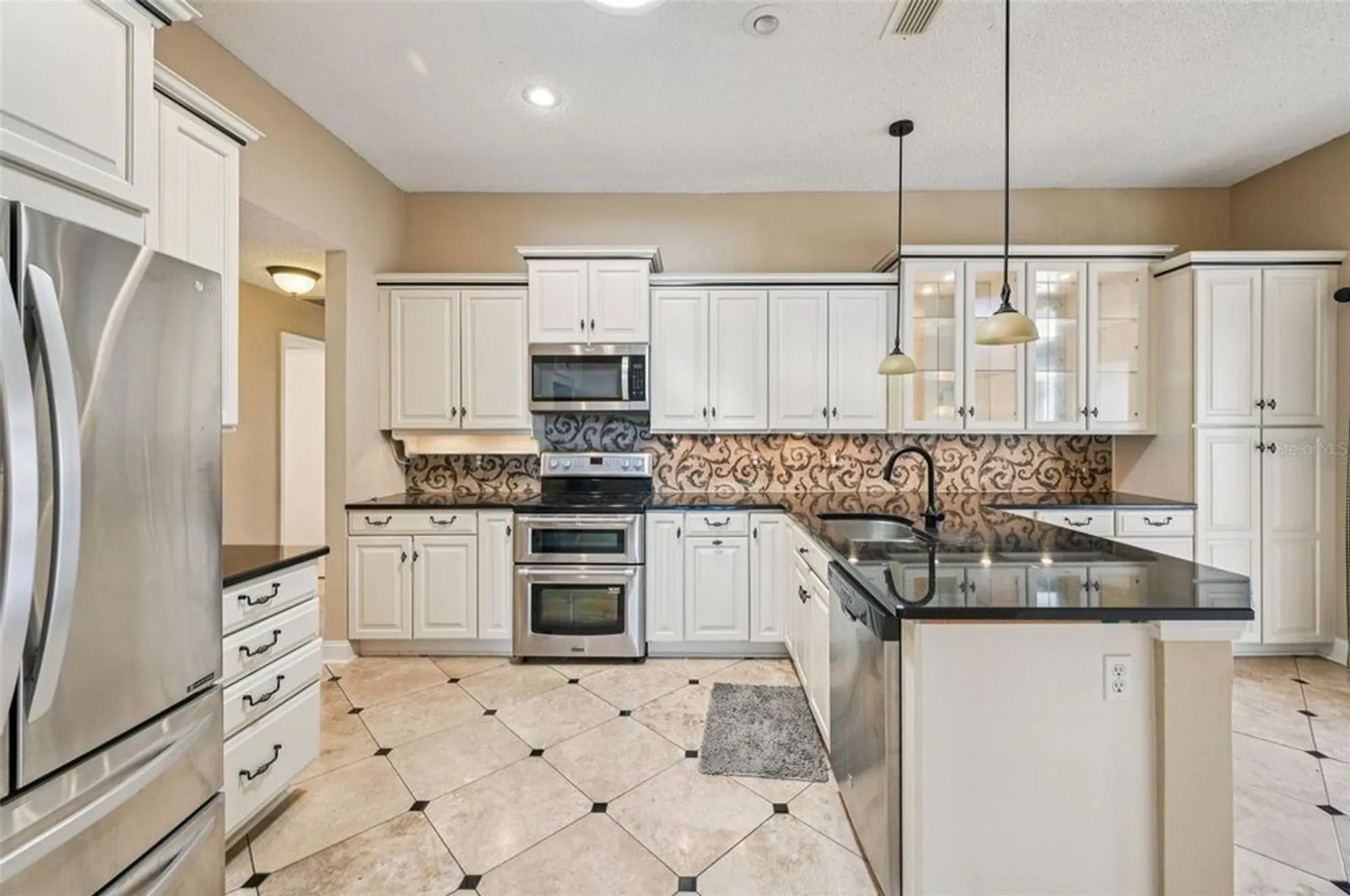 Property Slideshow image 12 of 70 | 675 masterpiece dr, Sun City Center, FL, 33573