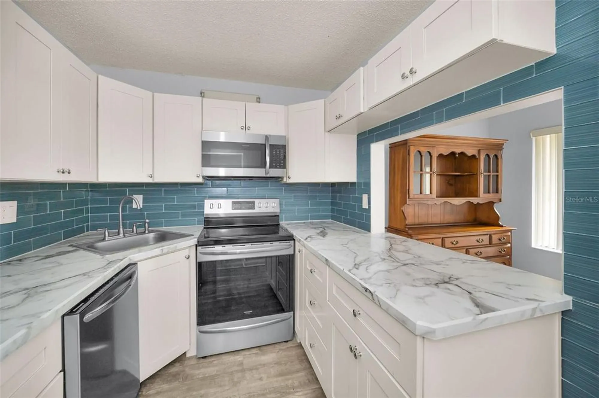 Property Slideshow image 11 of 70 | 2687 pine ridge way e1, Palm Harbor, FL, 34684
