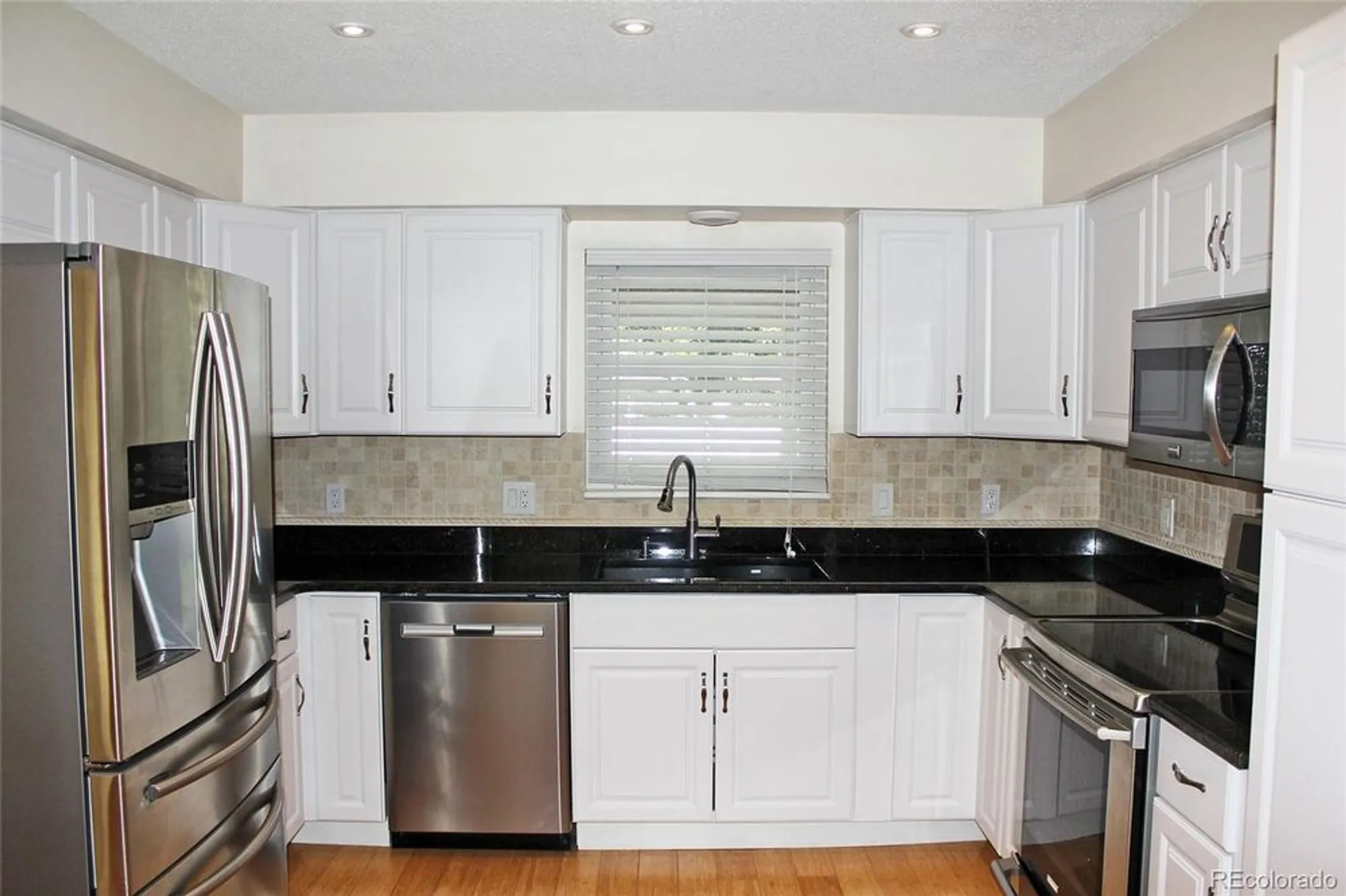 Property Slideshow image 8 of 35 | 2734 s heather gardens way, Aurora, CO, 80014