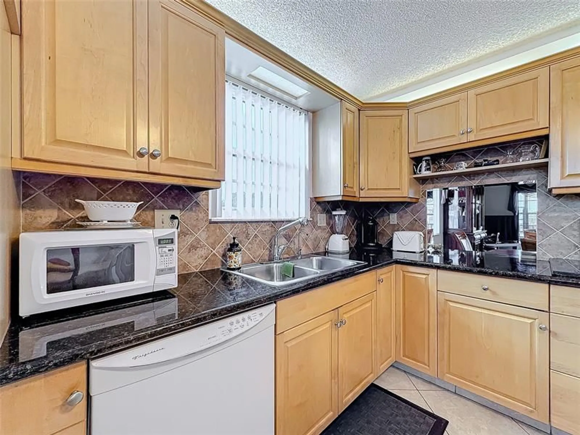 Property Slideshow image 15 of 62 | 4930 e sabal palm blvd 301, Tamarac, FL, 33319