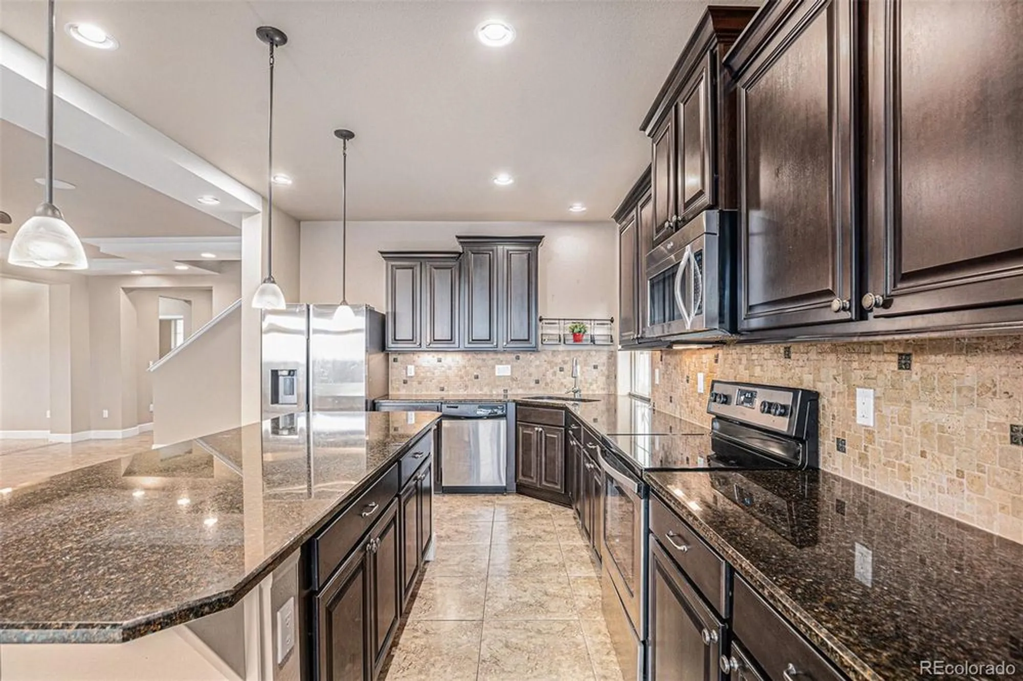 Property Slideshow image 14 of 28 | 5521 ensenada st, Denver, CO, 80249