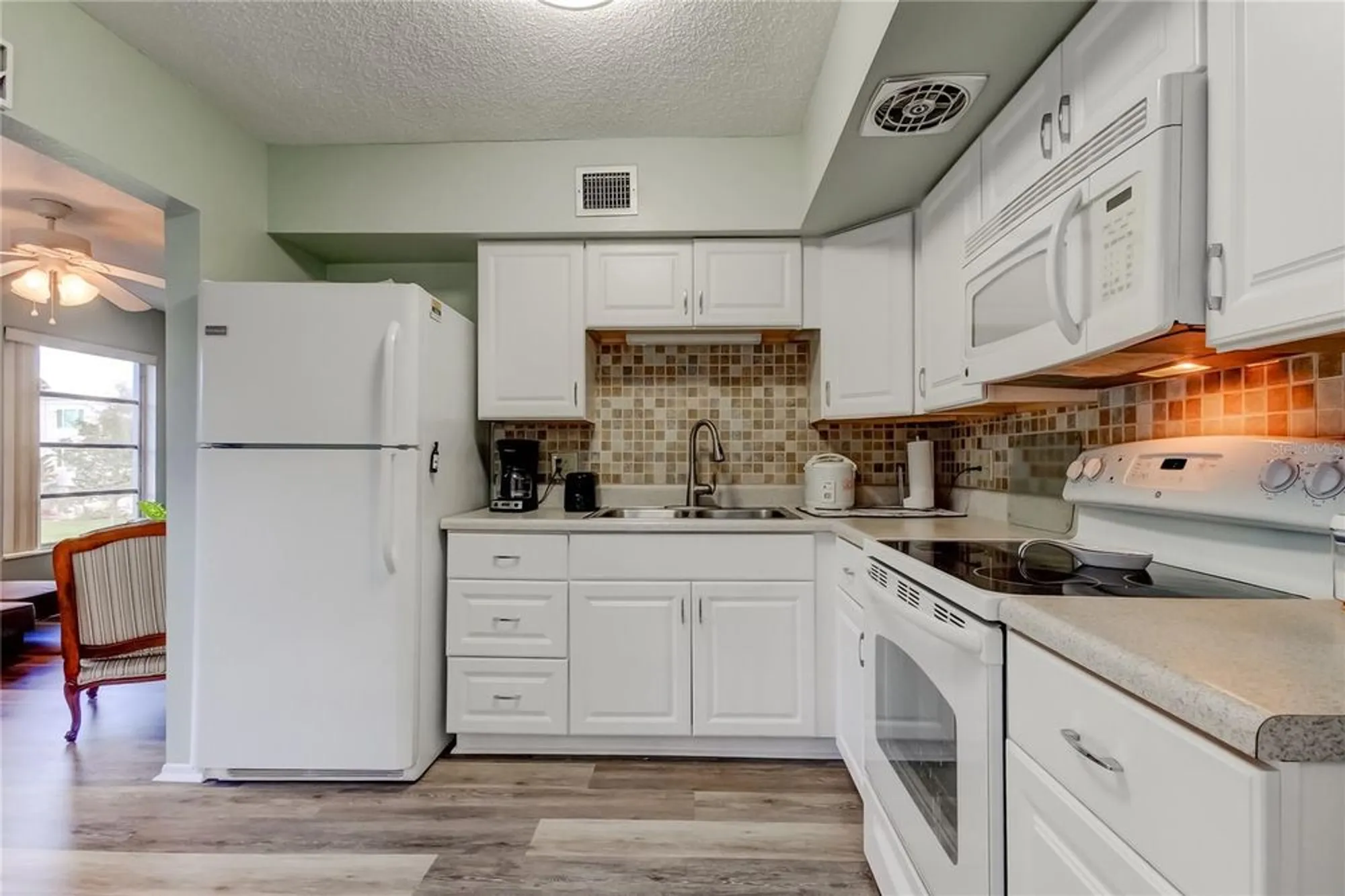 Property Slideshow image 12 of 46 | 2460 persian dr 26, Clearwater, FL, 33763