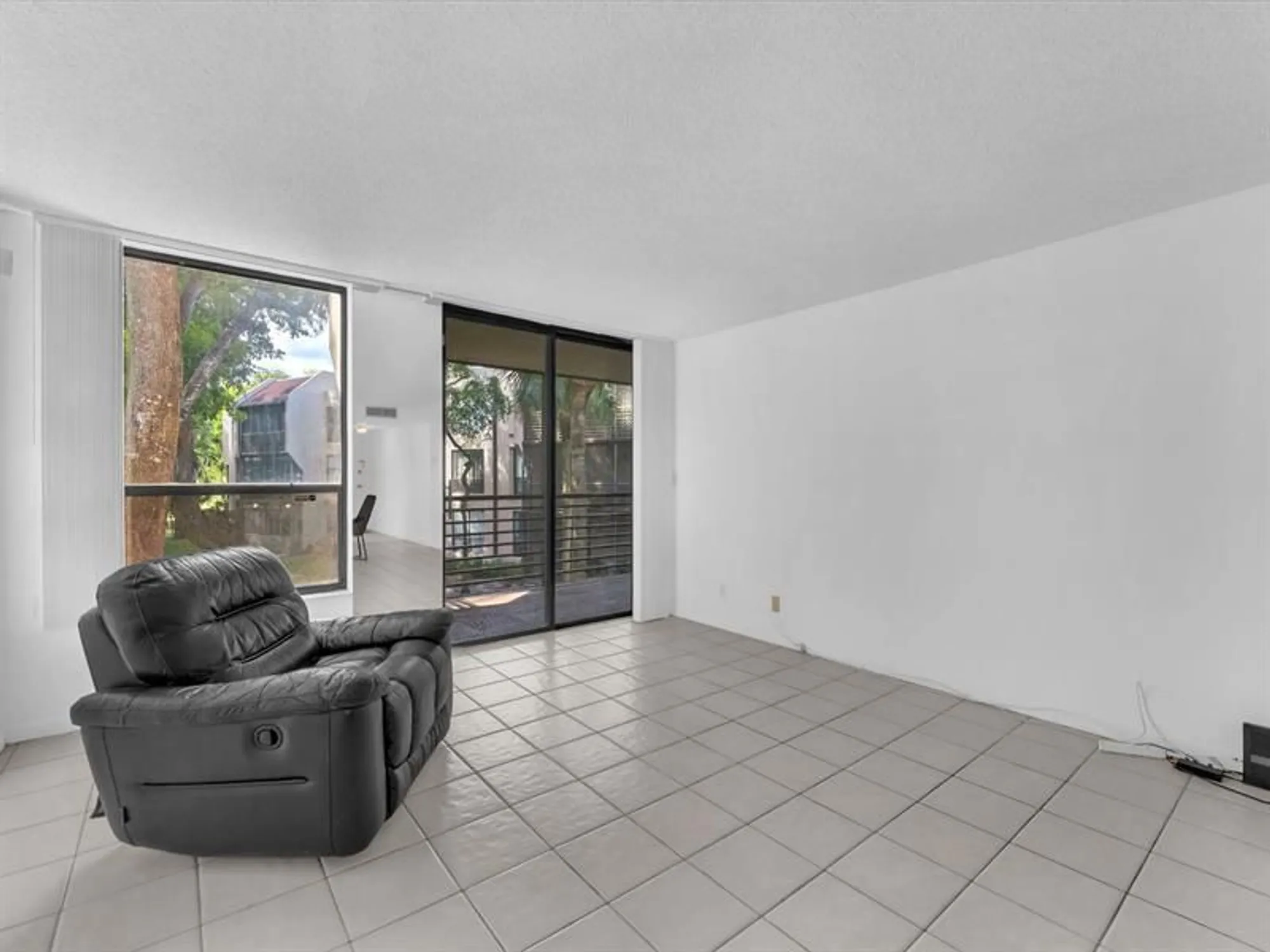 Property Slideshow image 9 of 37 | 7750 w mcnab rd apt 202, Tamarac, FL, 33321