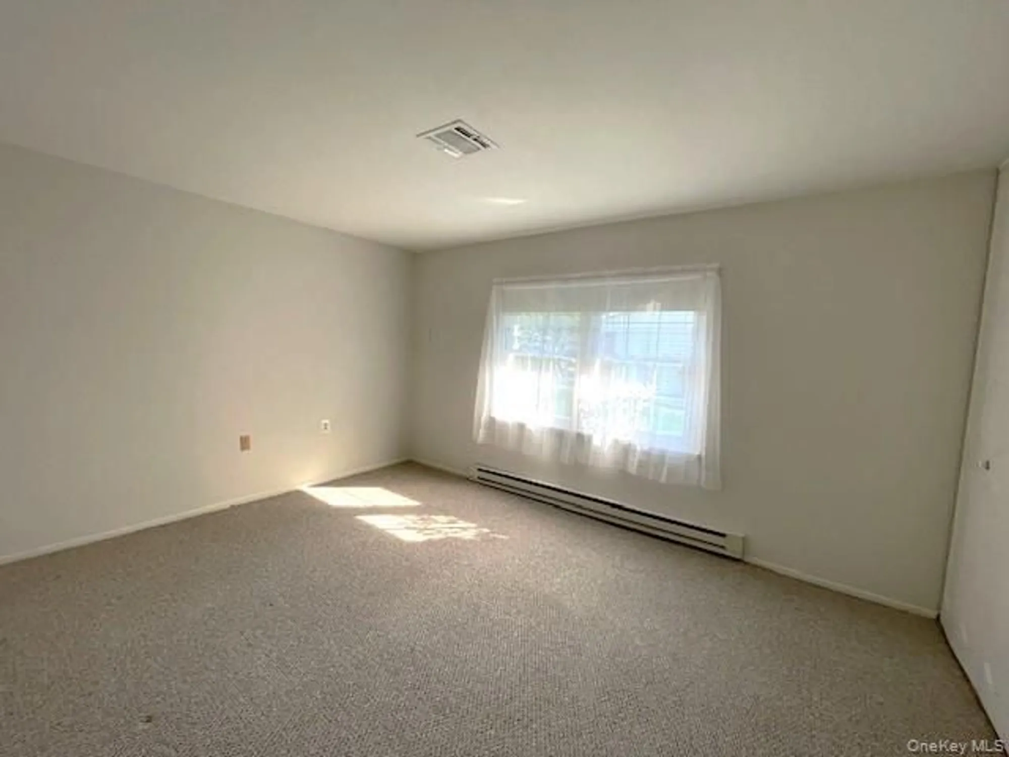 Property Slideshow image 6 of 14 | 120 exmore ct d, Ridge, NY, 11961