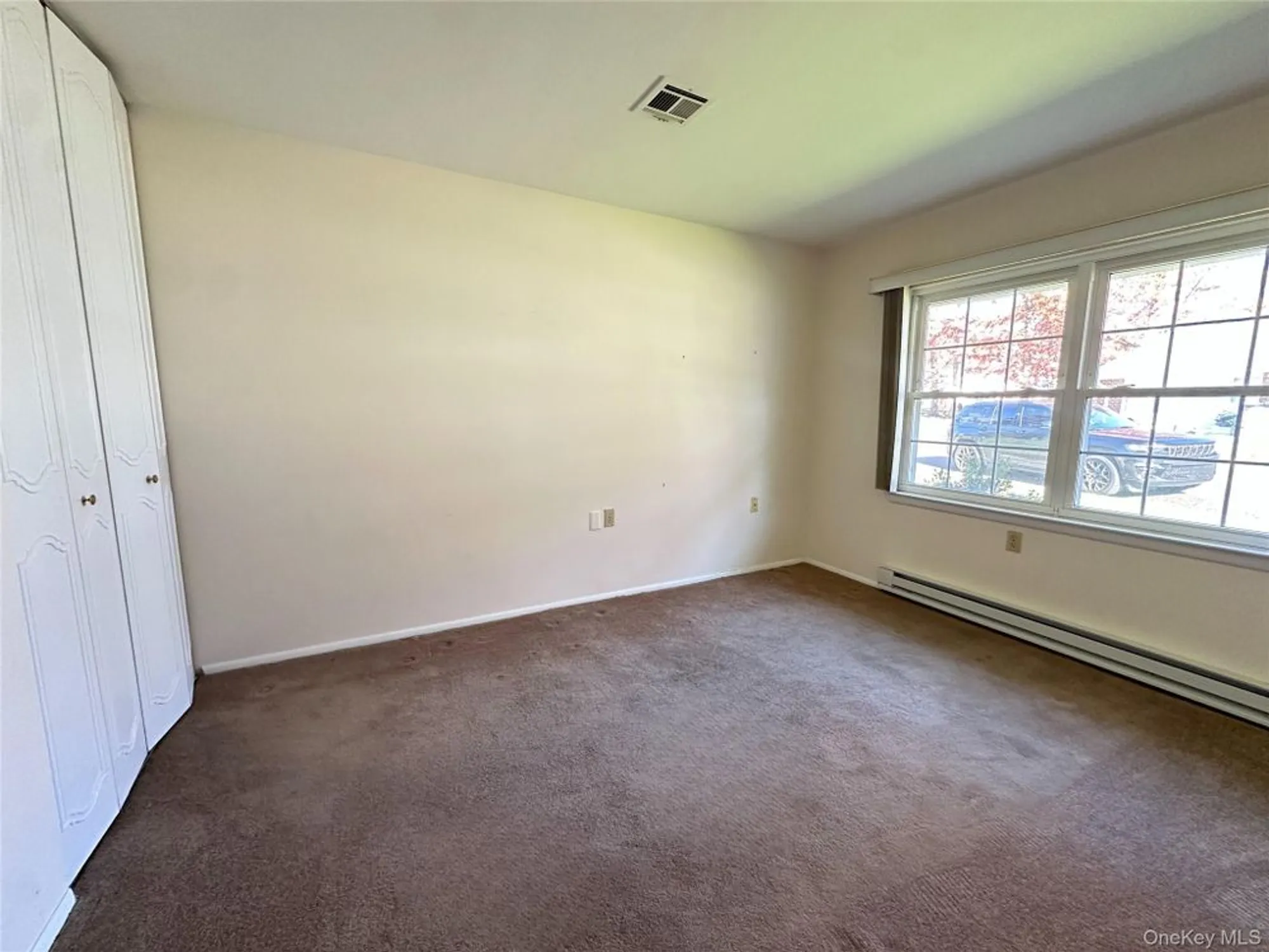 Property Slideshow image 10 of 15 | 215 woodbridge dr a, Ridge, NY, 11961