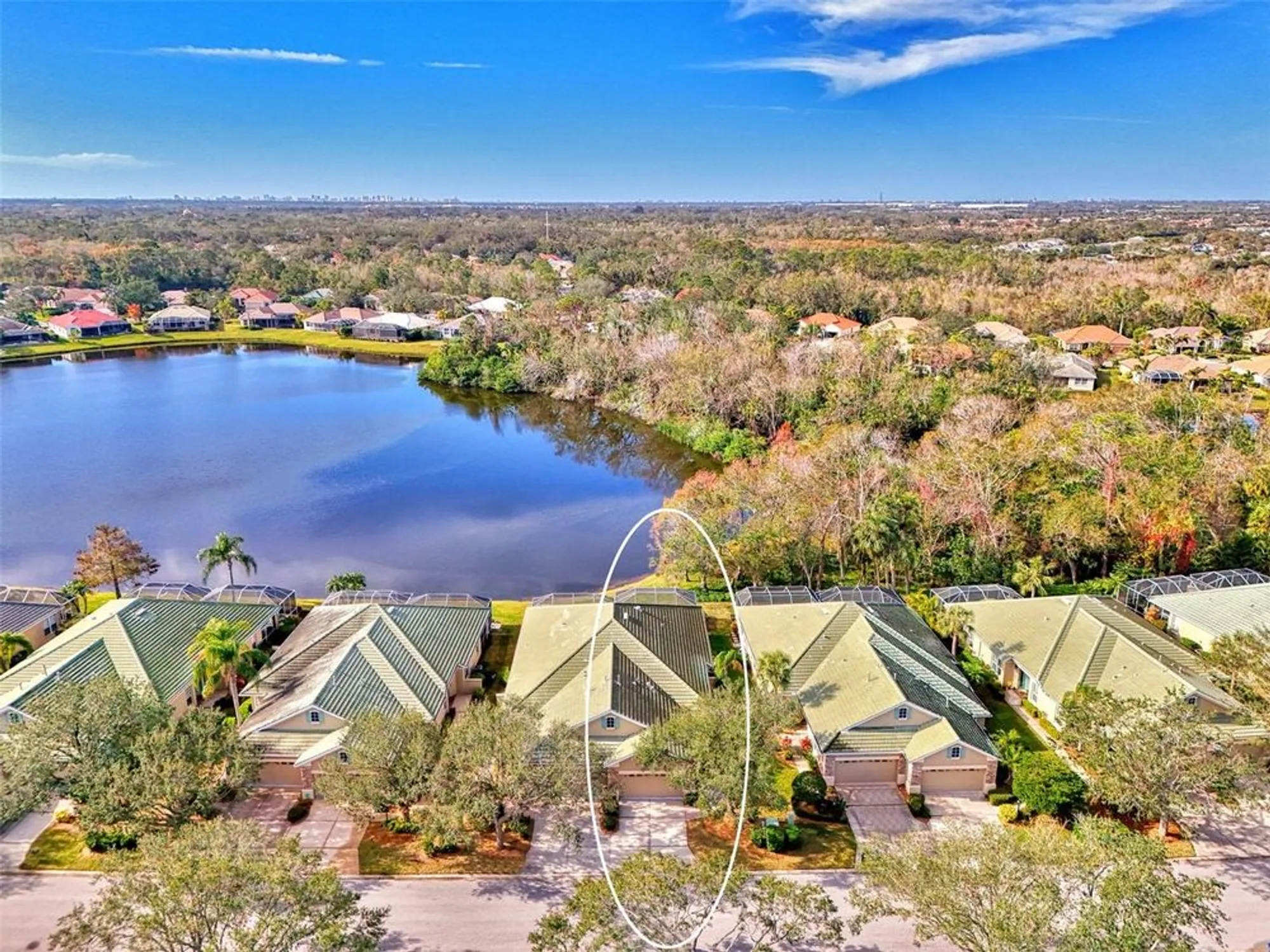 Property Slideshow image 7 of 53 | 4914 lakescene pl, Sarasota, FL, 34243