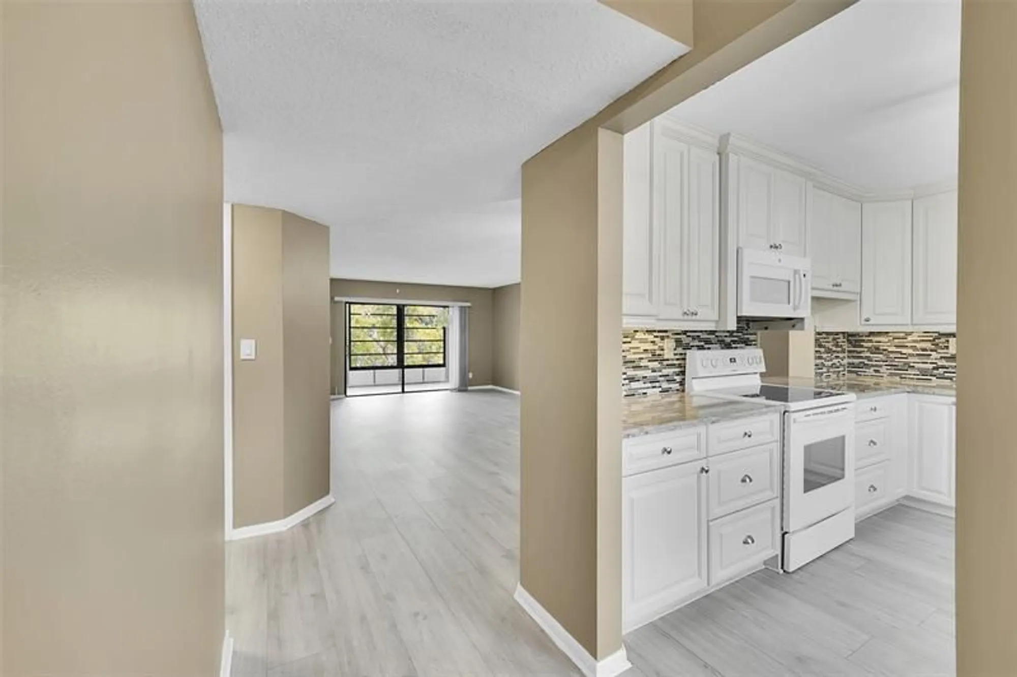 Property Slideshow image 5 of 30 | 4950 e sabal palm blvd 302, Tamarac, FL, 33319