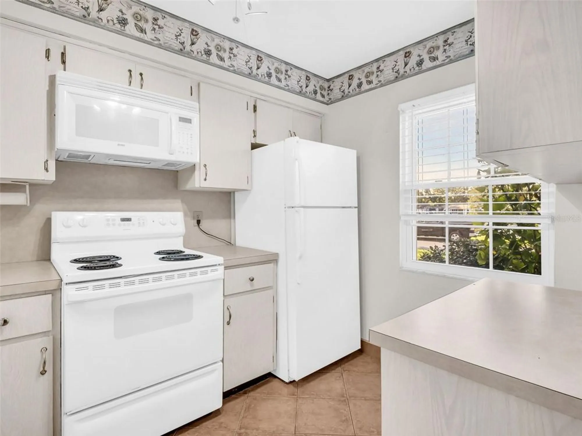 Property Slideshow image 9 of 62 | 3109 mission grove dr d, Palm Harbor, FL, 34684