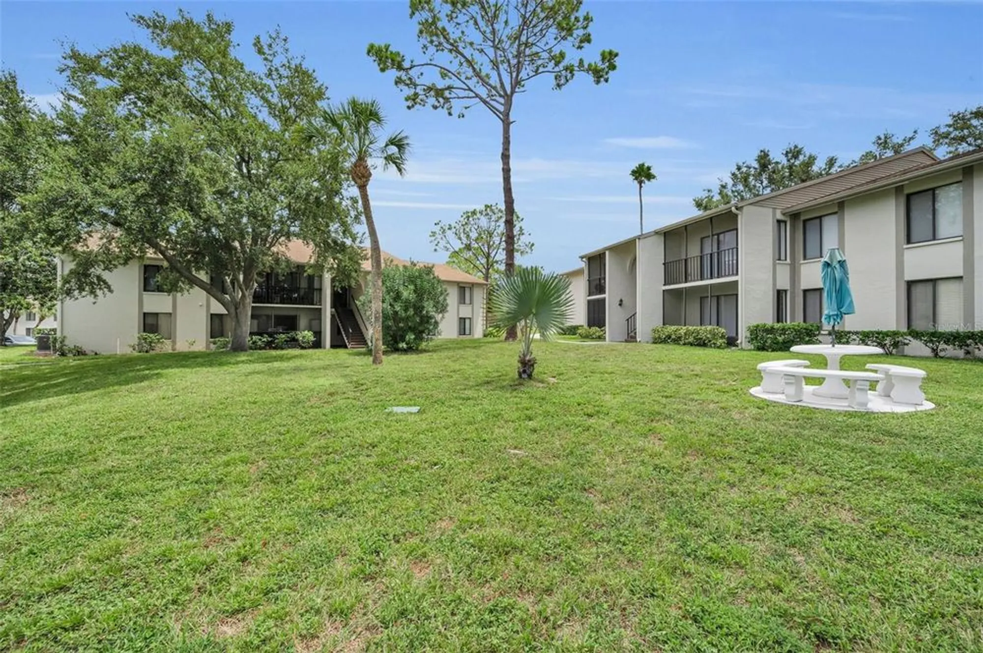Property Slideshow image 5 of 65 | 2666 pine ridge way c2, Palm Harbor, FL, 34684